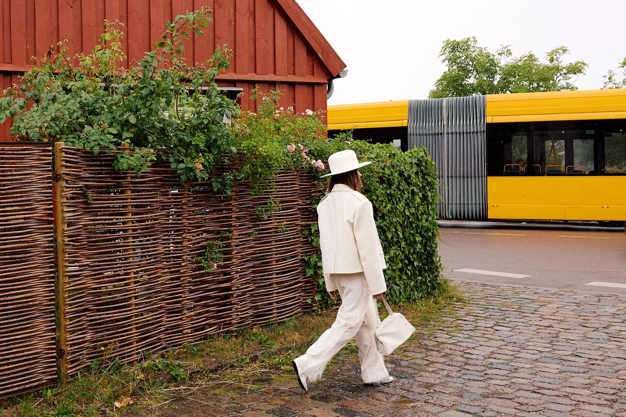Street Style Photography: Copenhagen Fashion Week Spring/Summer for "Spotted by Pinterest" Campaign - Feather Trimmed Trousers and Wide Brim Hat