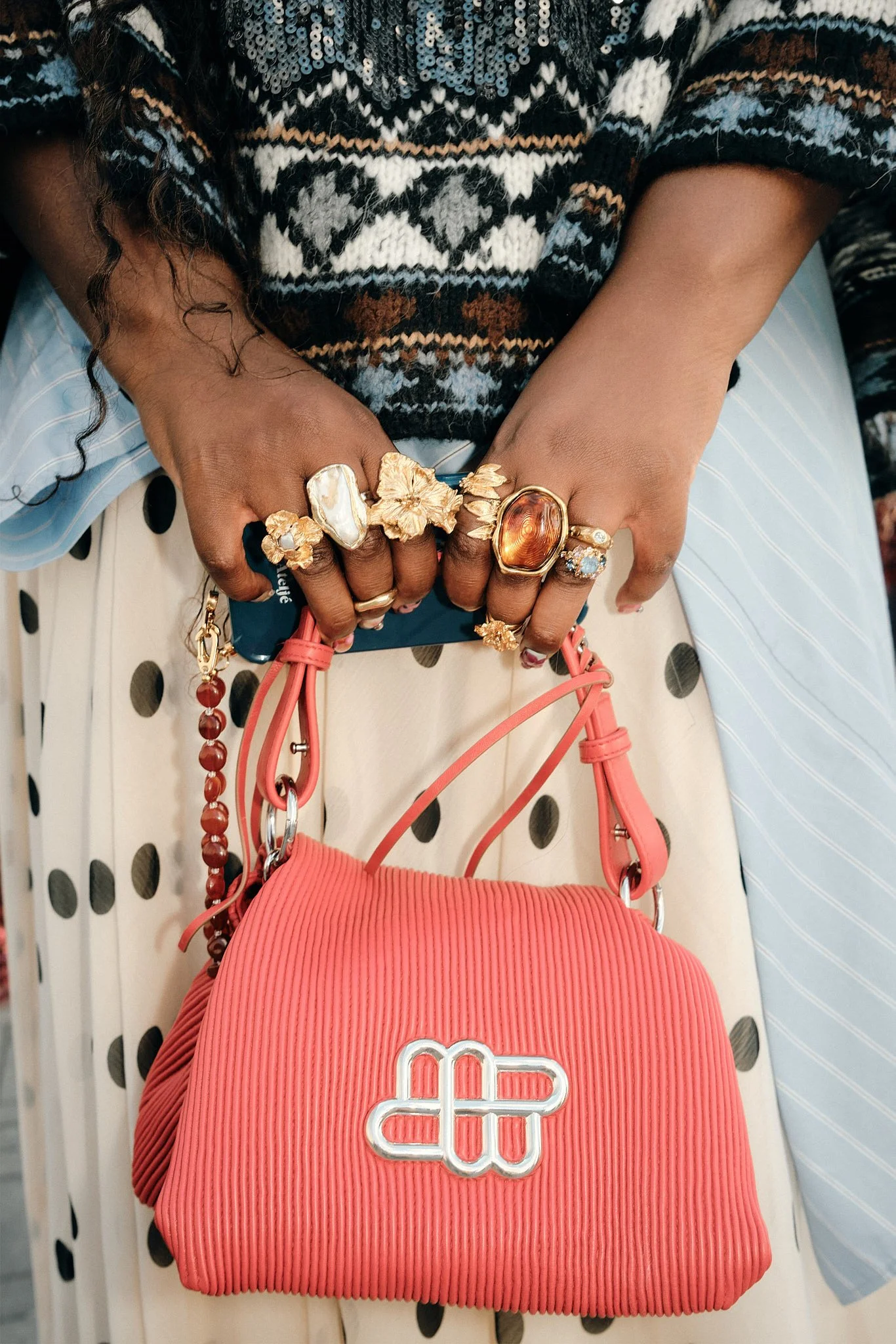 Street Style Photography: Copenhagen Fashion Week Spring/Summer for "Spotted by Pinterest" Campaign - Gold Floral Statement Rings and Coral Leather Bag