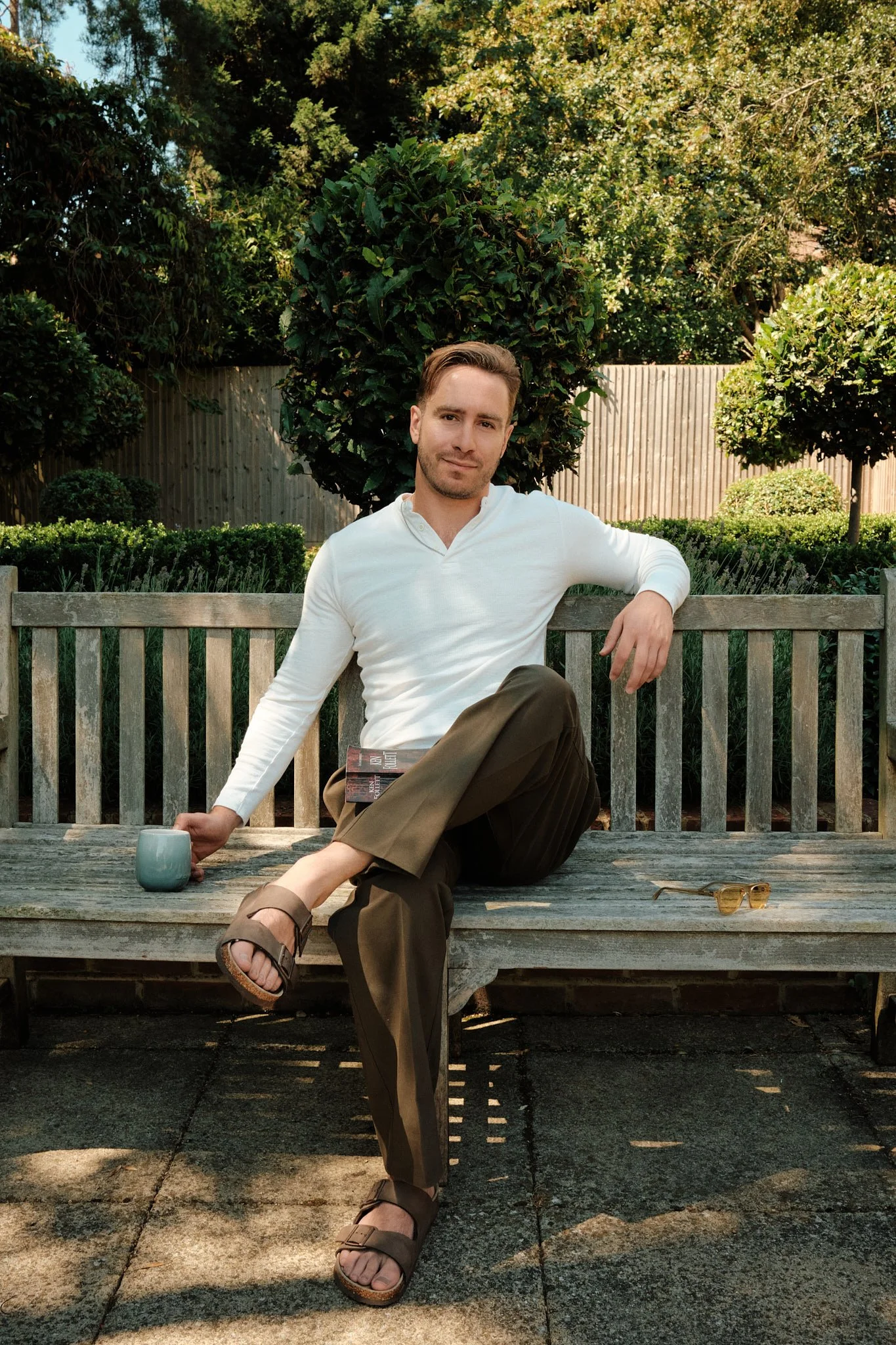 Dating Photographer London | Man with Coffee on a Garden Bench