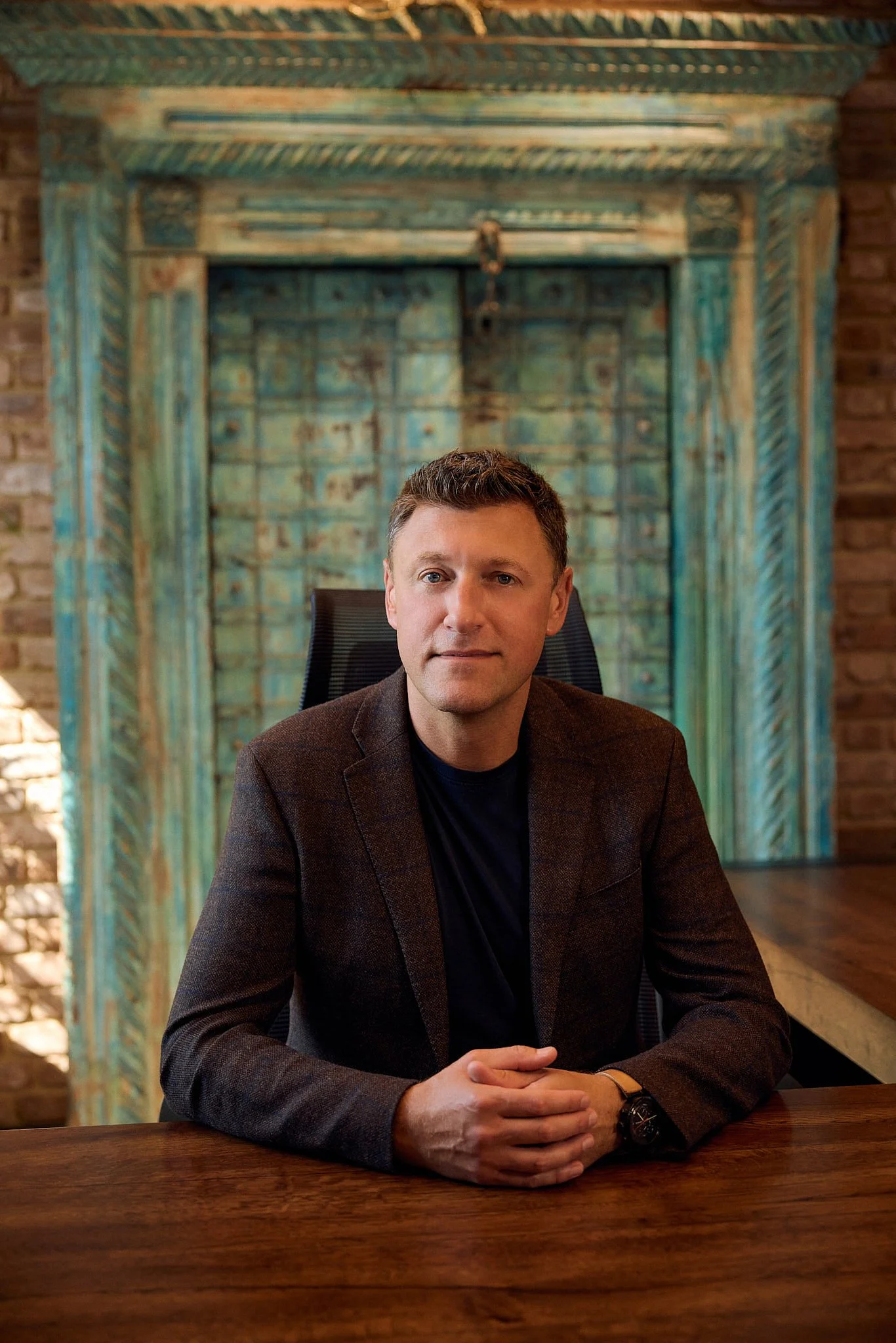 Portrait Photographer London | Leader Framed by Antique Door