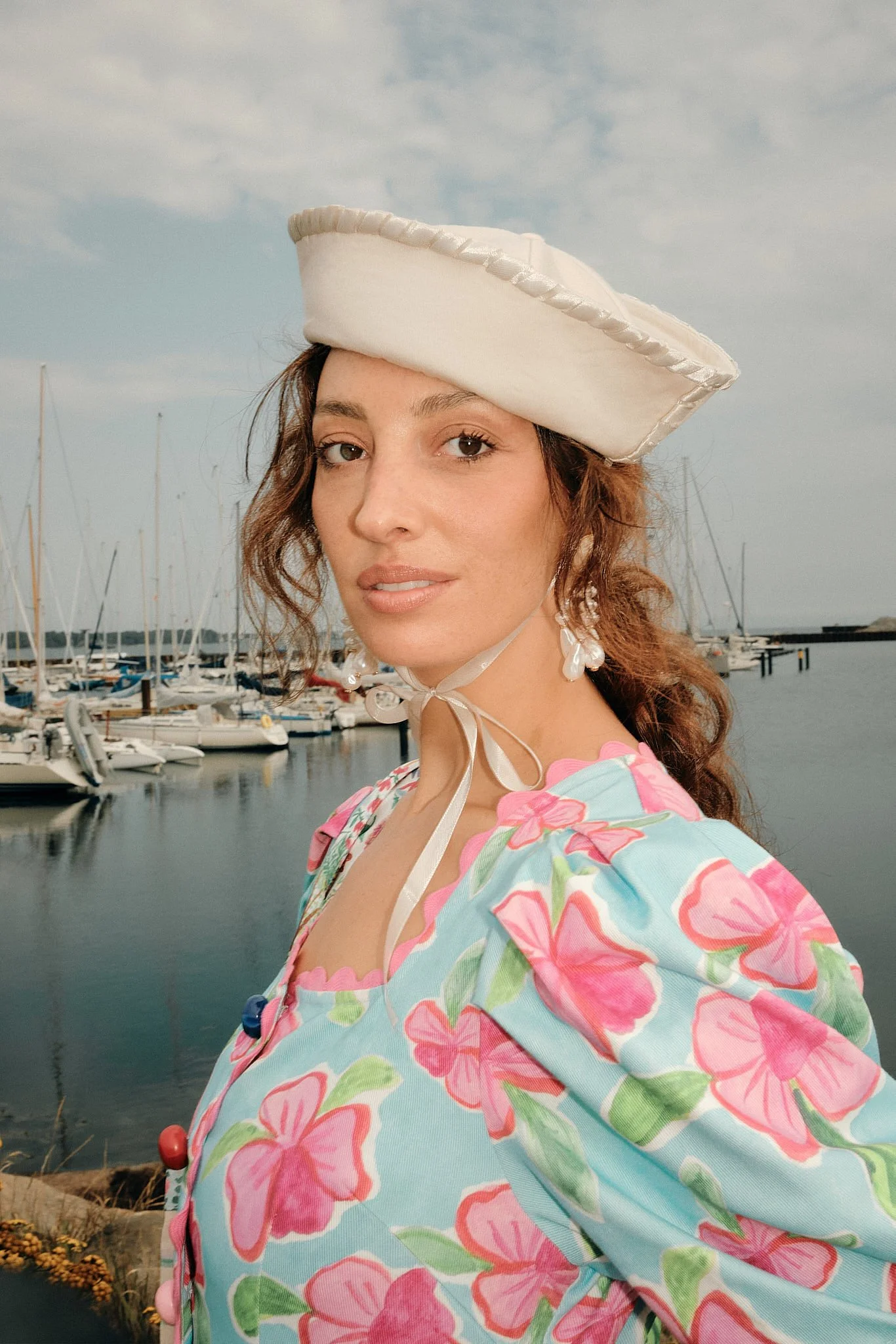 Portrait Photographer London | Sailor Hat and Harbour Light for Pinterest