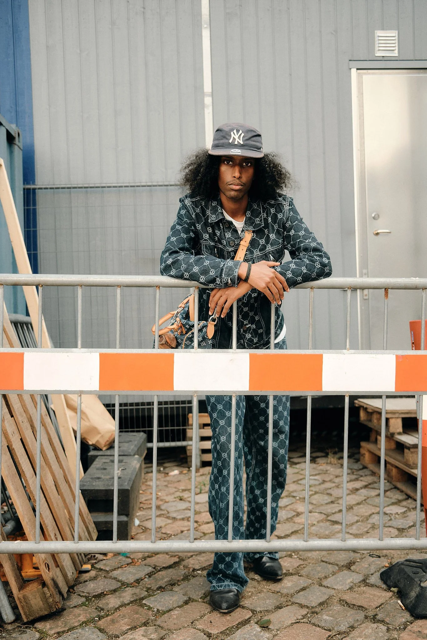 Portrait Photographer London | Leaning on the Barrier Street Style for Pinterest