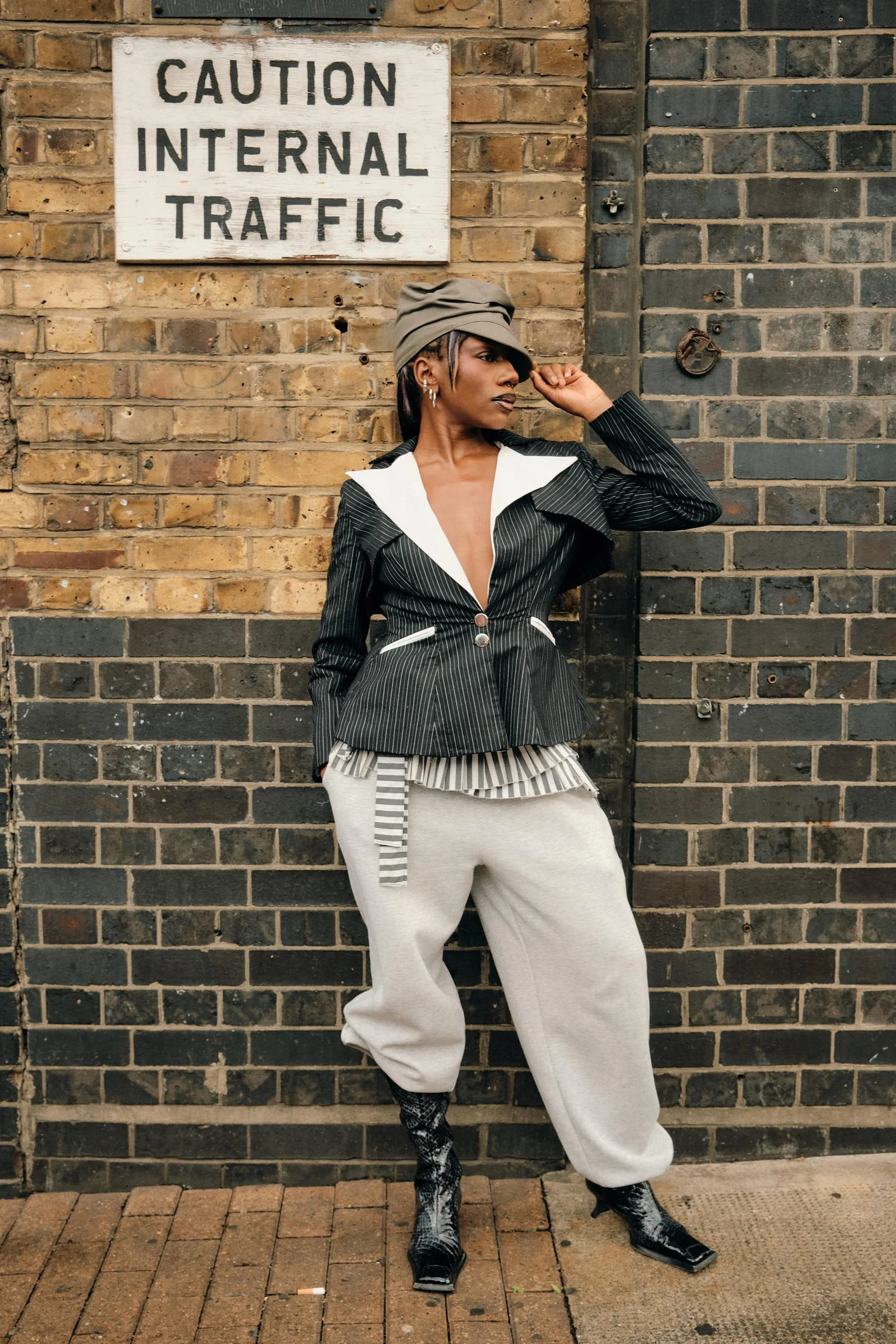 London Fashion Week Street Style | Bina Under the Caution Sign