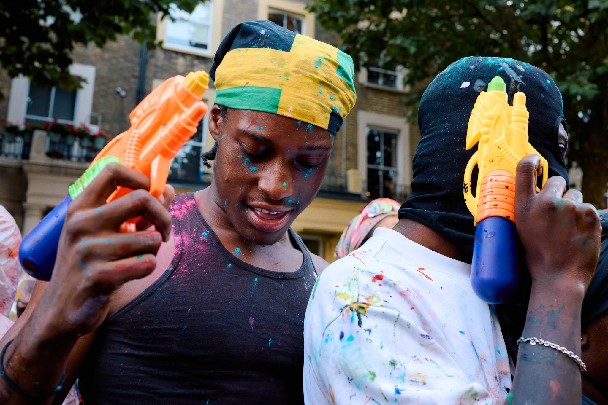 Notting Hill Carnival Street Photography | Water Pistols at the Ready