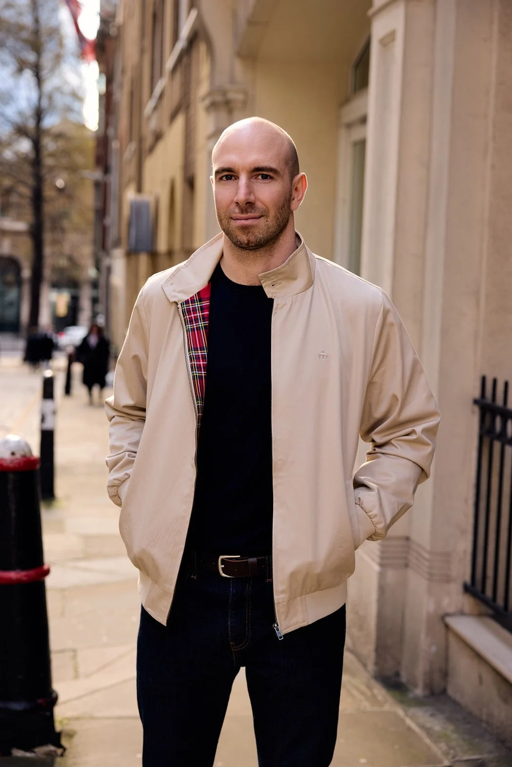 Dating photography confident portrait of man looking at camera with slightly blur background