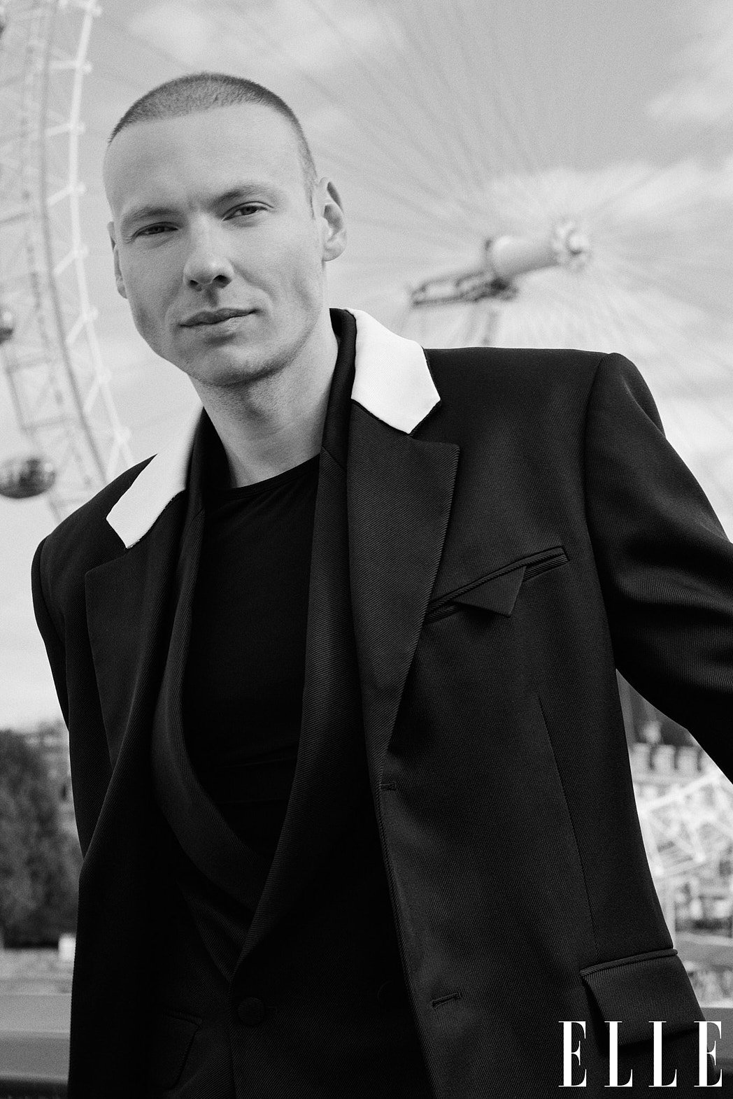 Personal branding photography of fashion consultant Bernard Garby black and white portrait with London Eye in background for ELLE Lithuania print magazine editorial feature