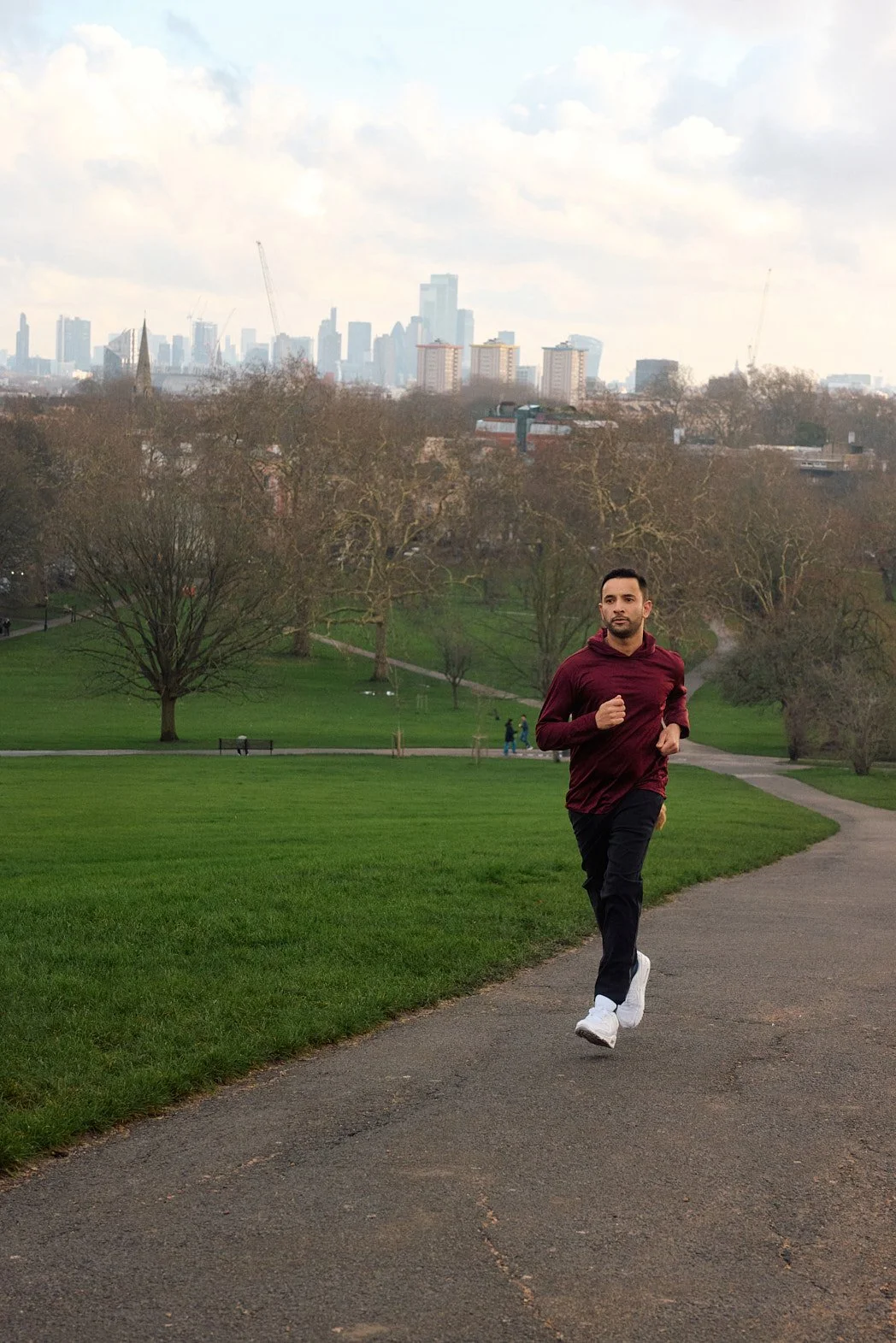 Dating photographer portrait of man running in Primrose Hill in London