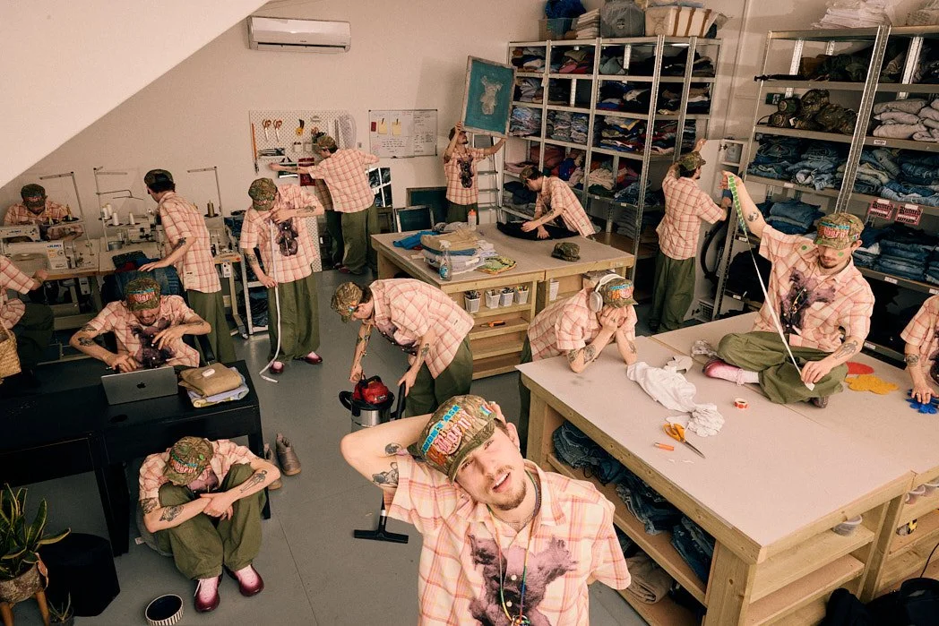 Personal branding photographer London lifestyle photography editorial of menswear clothing designer Joshua Samuels in his studio for DanceWax magazine editorial with layers of subject scattered in poses and action around studio composite image
