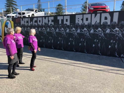Local Grandmothers reflecting on the mural.