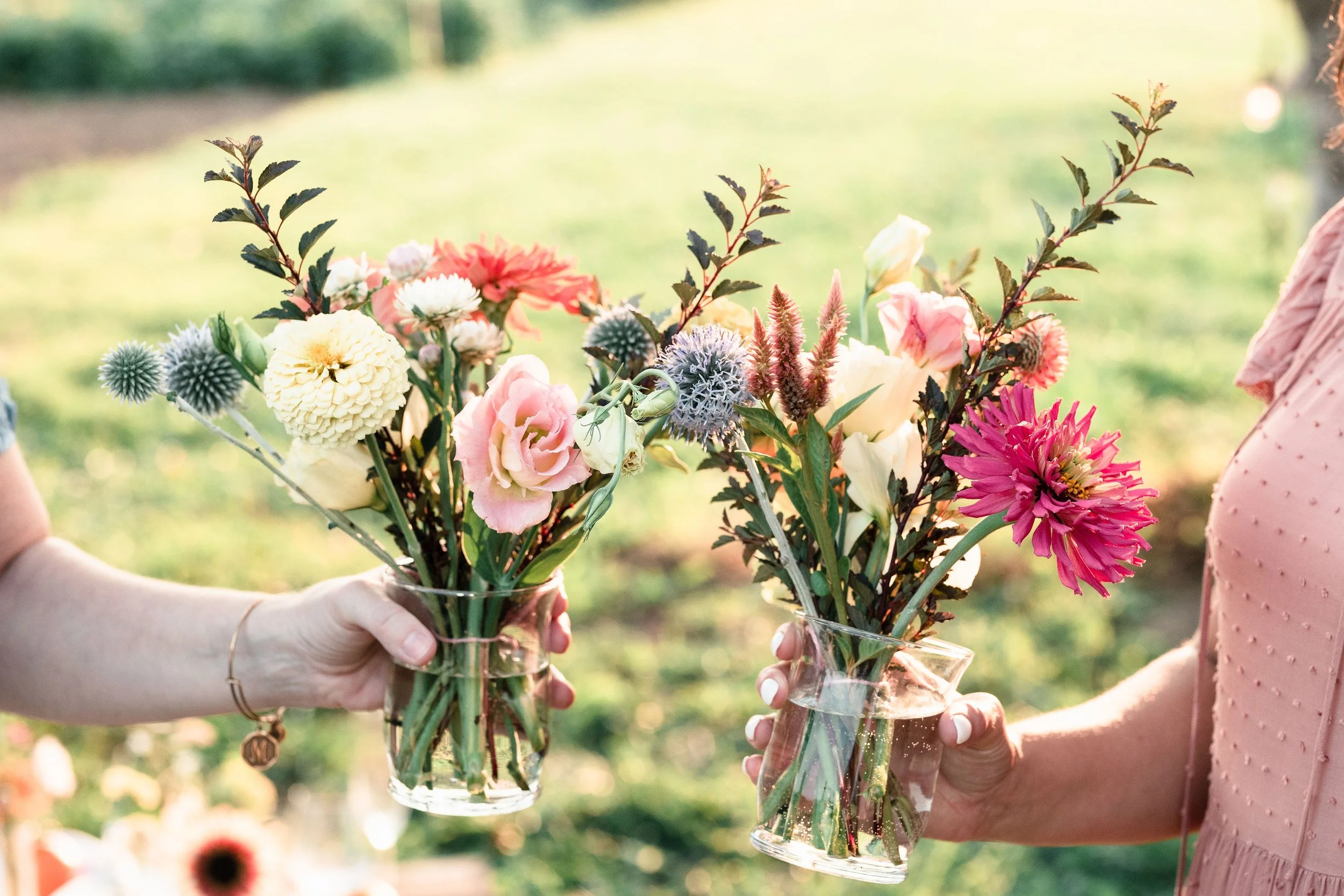 bouquets in glasses.JPG