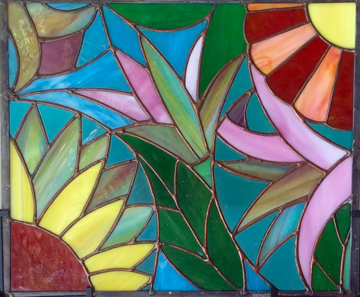 The process of designing and making stained glass. — Yvette M Connor