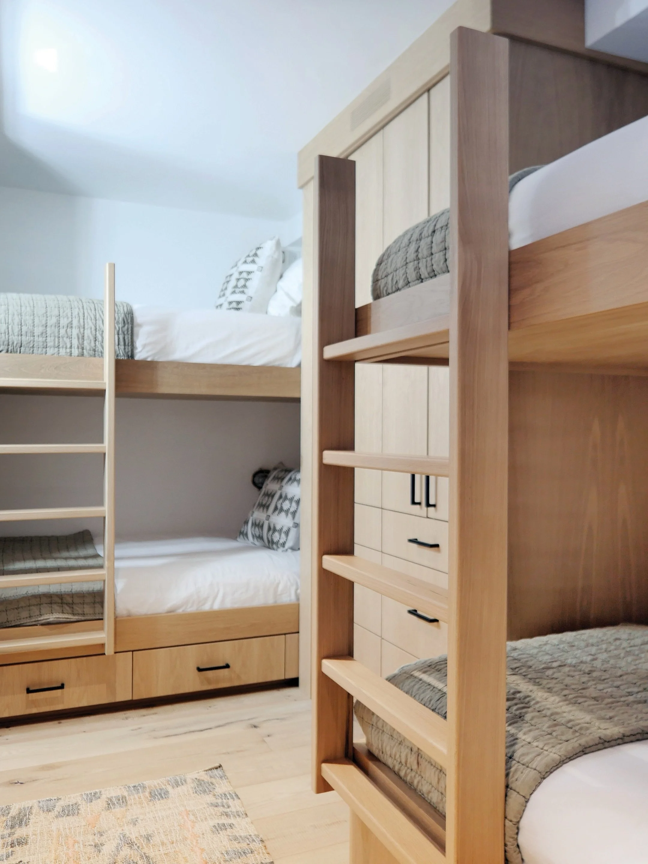Designed to make room for everyone.⁠
⁠
At Hillside North, every inch was thoughtfully considered &mdash; including this custom bunk room, created to bring comfort, storage, and a sense of ease to a compact Telluride home.⁠
⁠
Warm wood, built-in ladde