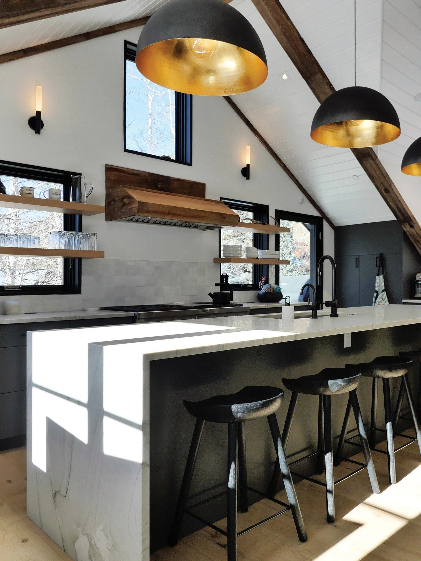 A kitchen designed for the rhythm of mountain living.⁠
⁠
From morning coffee at the island to dinner after a day outside, this space was created to feel open, functional, and deeply connected to the rest of the home.⁠
⁠
Warm wood, layered lighting, a