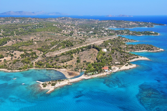 Costa Fina, a 68-acre seafront compound on the Greek Riviera, redefines jet-set living with its own paved airstrip, aircraft hangar, airport terminal, and three helipads.