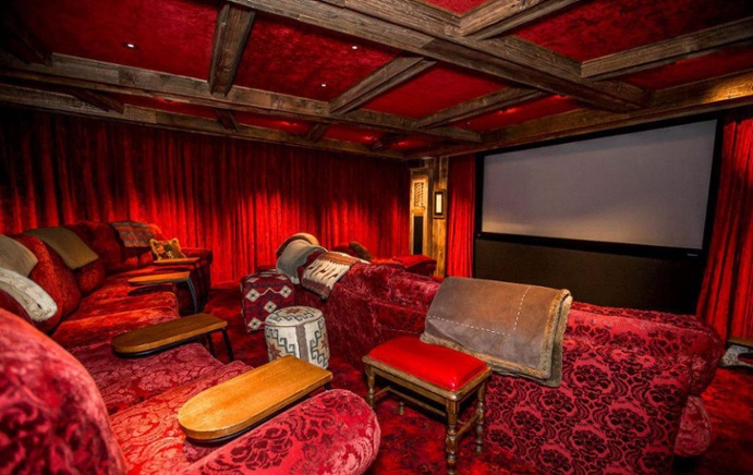A movie theater and heated driveway are just some of the indulgences that await the new owner of this Montana mountain retreat.