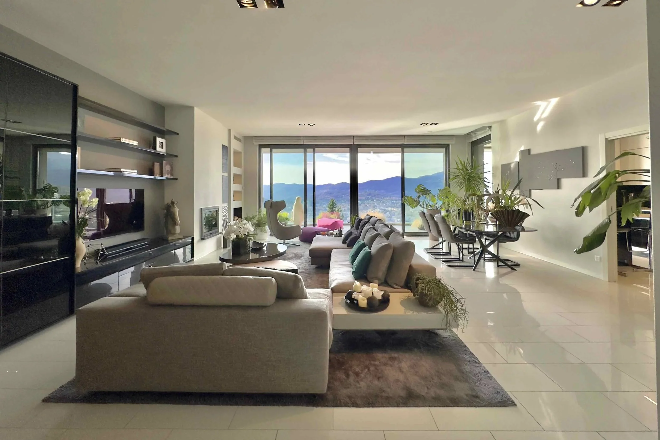 Experience the highest living comfort with a private roof terrace - Luxury penthouse in Aldesago with exclusive panoramic views of Lake Lugano & possible second home