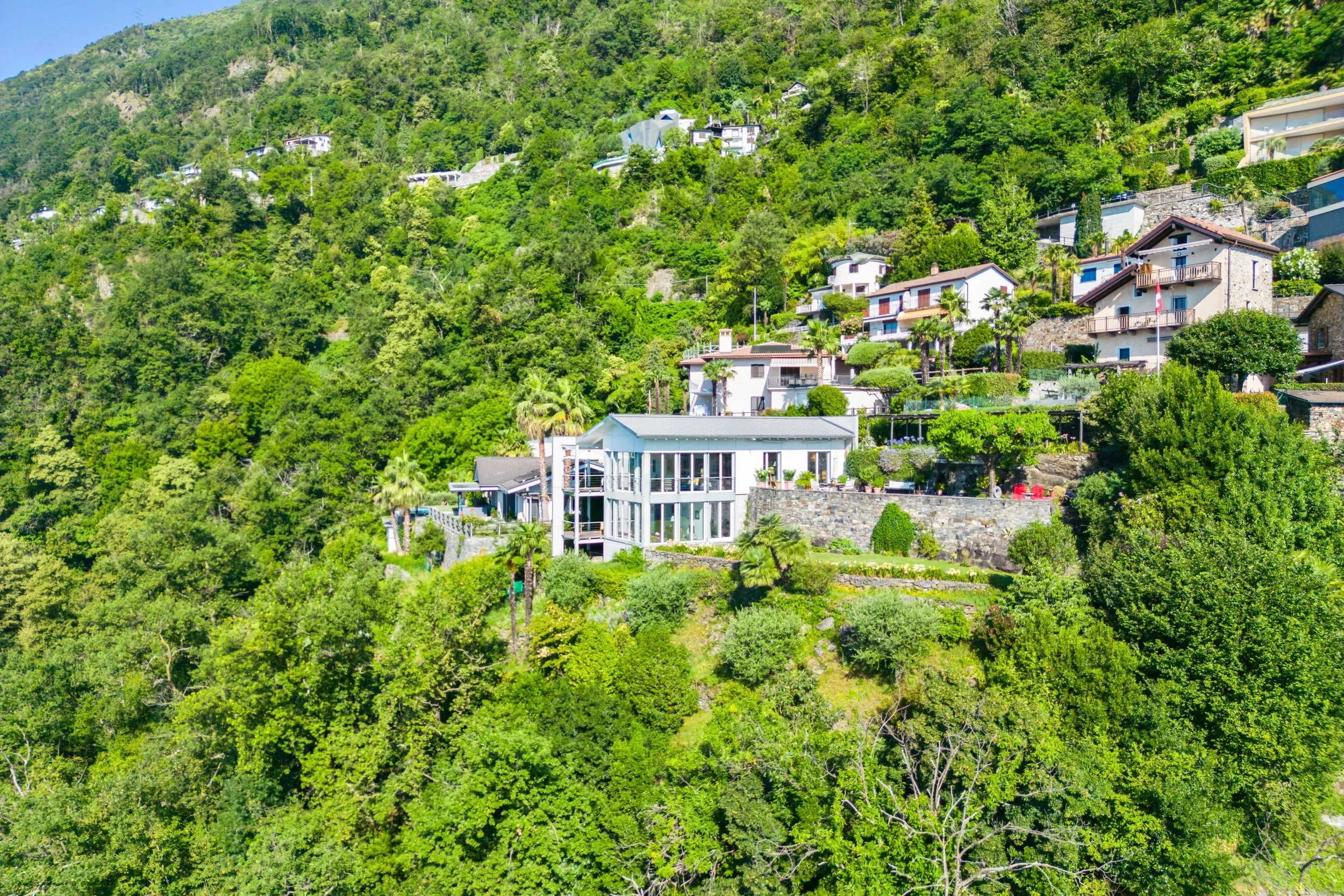Extraordinary view over Lake Maggiore in Ronco sopra Ascona - A peaceful oasis in nature with panoramic terraces &amp; a private garden