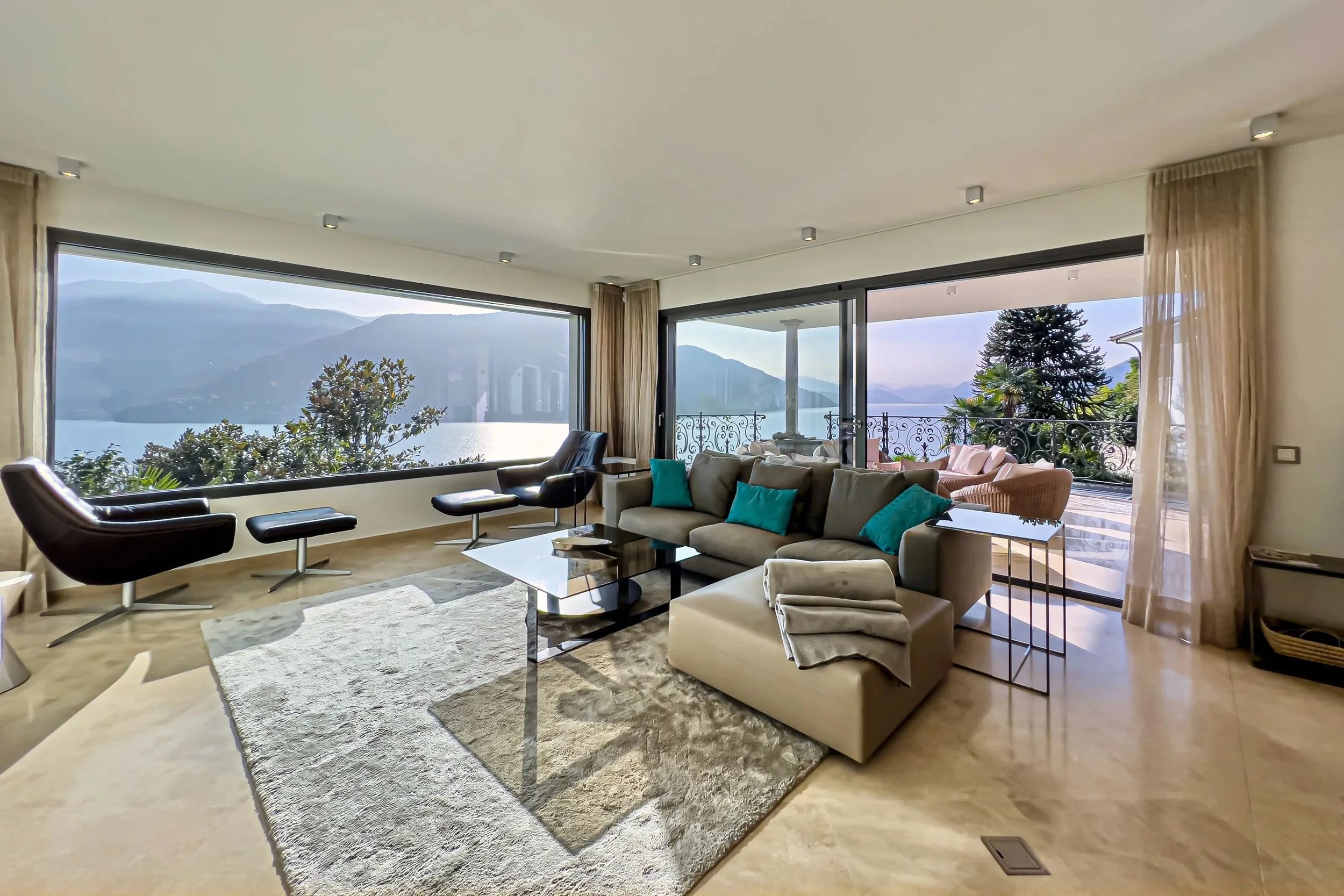 Дизайнерская квартира с панорамными видами — современная жемчужина с видом на озеро, идеально подходящая в качестве второй резиденции в Бриссаго