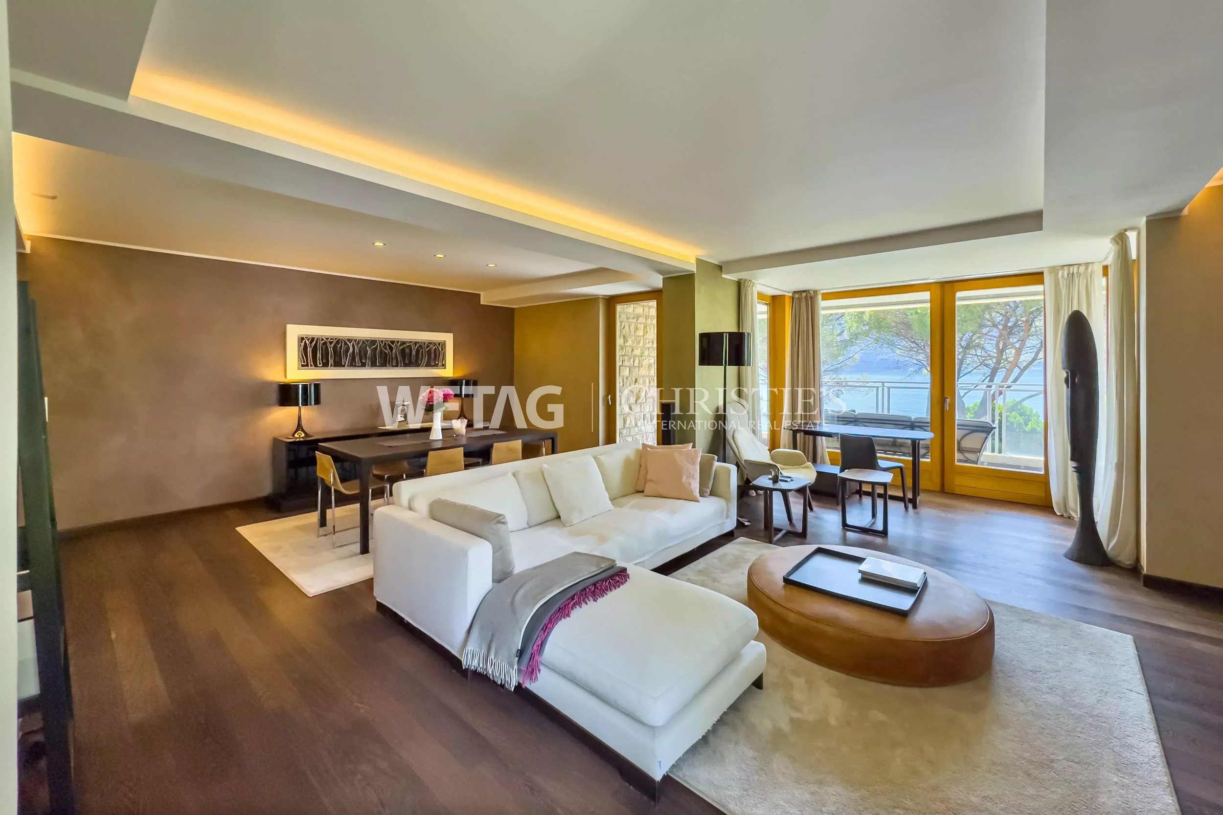 Apartment with direct lake access in Bissone - Modern elegance on the water with boat dock &amp; magnificent panoramic views