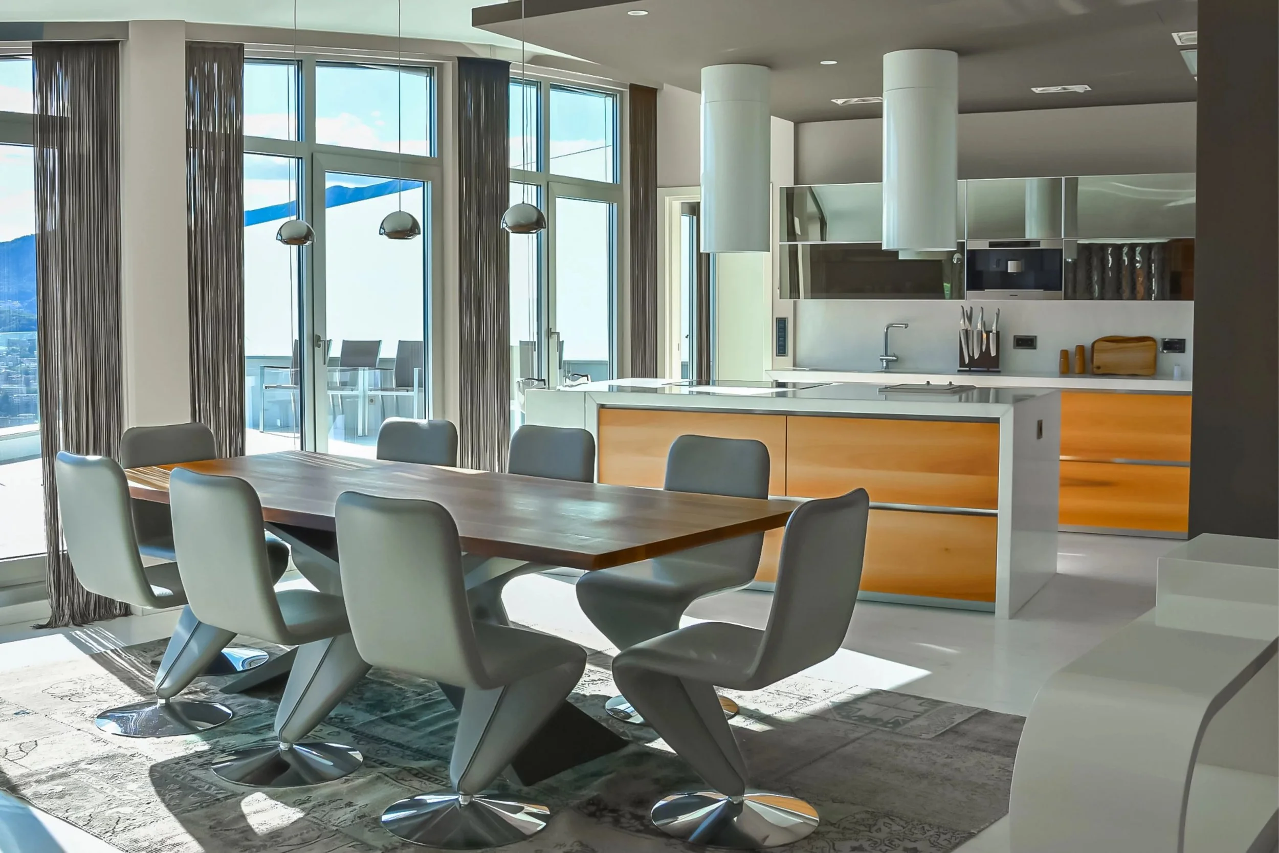 Vita contemporanea sopra i tetti di Lugano - Un attico unico ad Aldesago ricco di stile, luce, comfort e vista panoramica