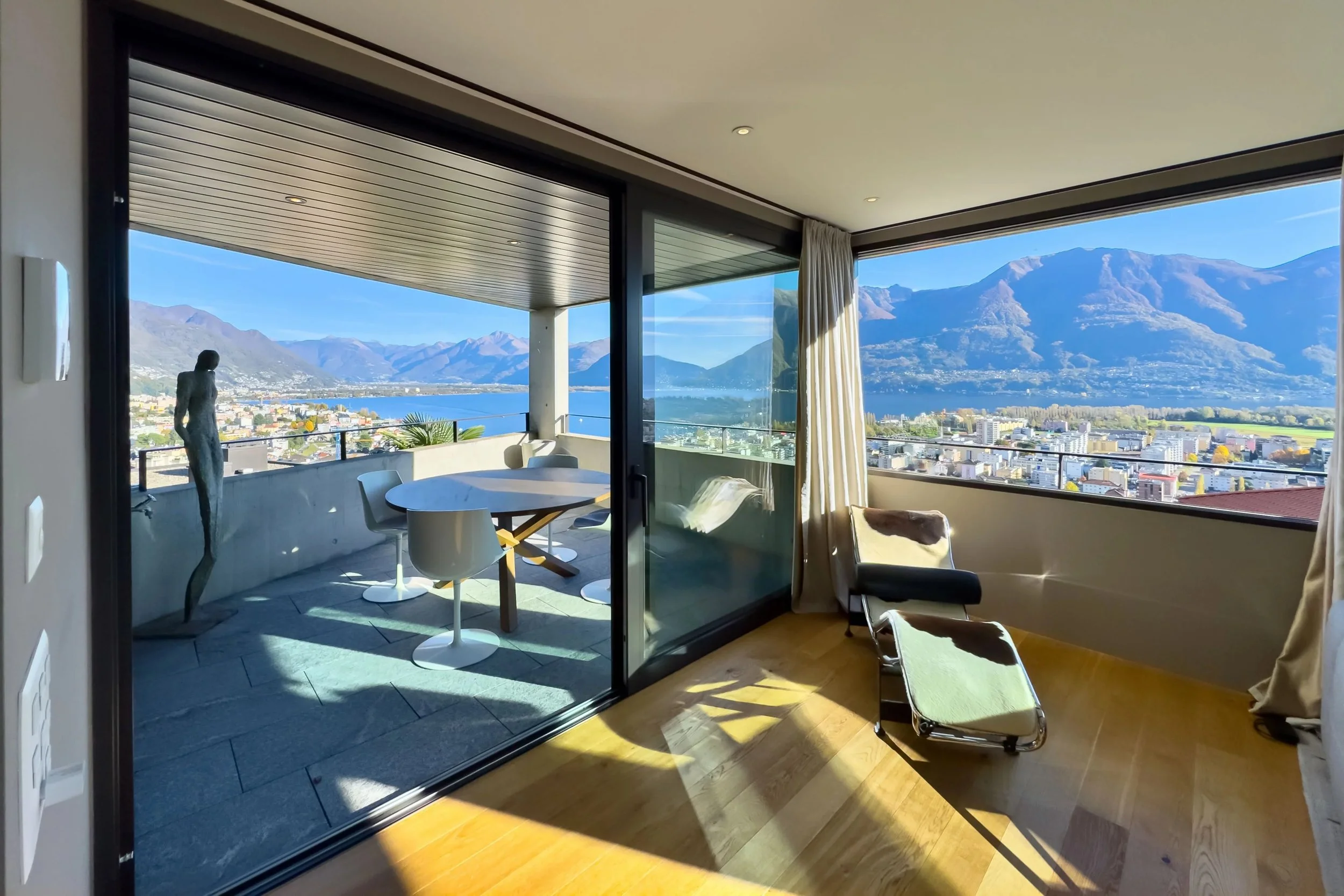  Architecture • Aesthetics • Panoramic View - Modern duplex penthouse with spectacular views over Lake Maggiore &amp; Locarno