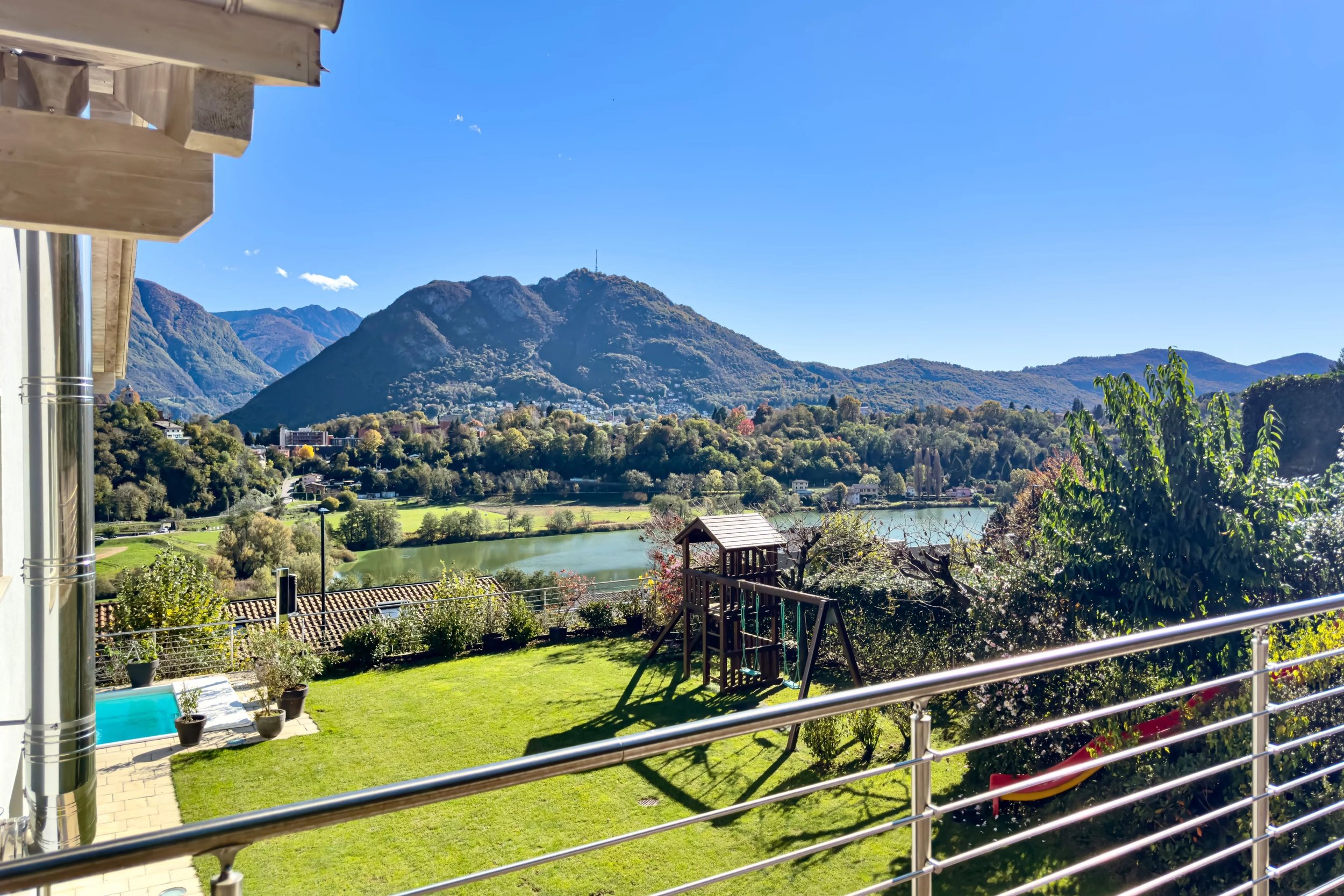 A place where light &amp; tranquillity reside - Stylish 7-room villa with garden, pool &amp; panoramic lake view in Breganzona