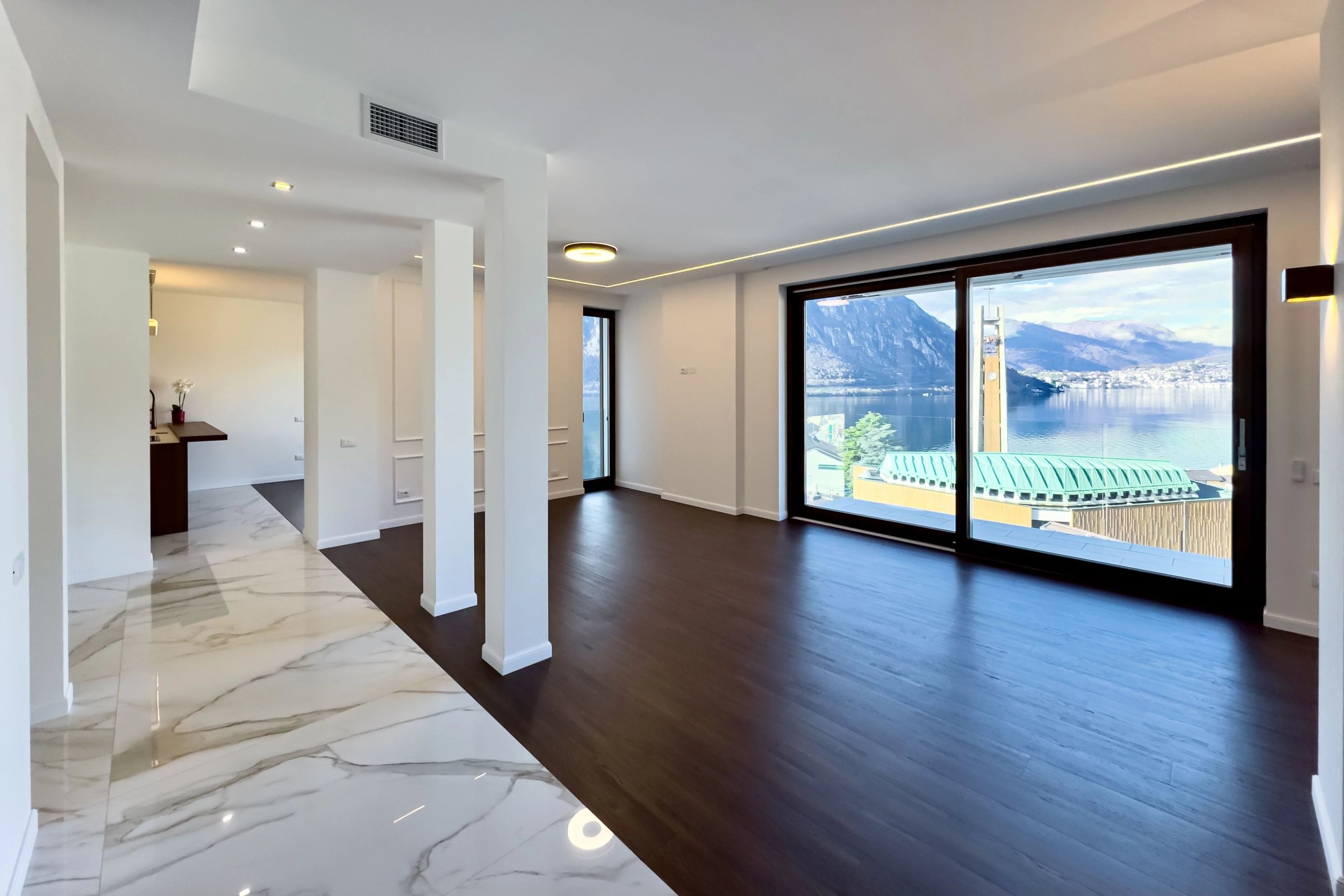 Architettura e panorama in perfetta armonia - Residenza di design a Campione d'Italia con i vantaggi del sistema fiscale italiano