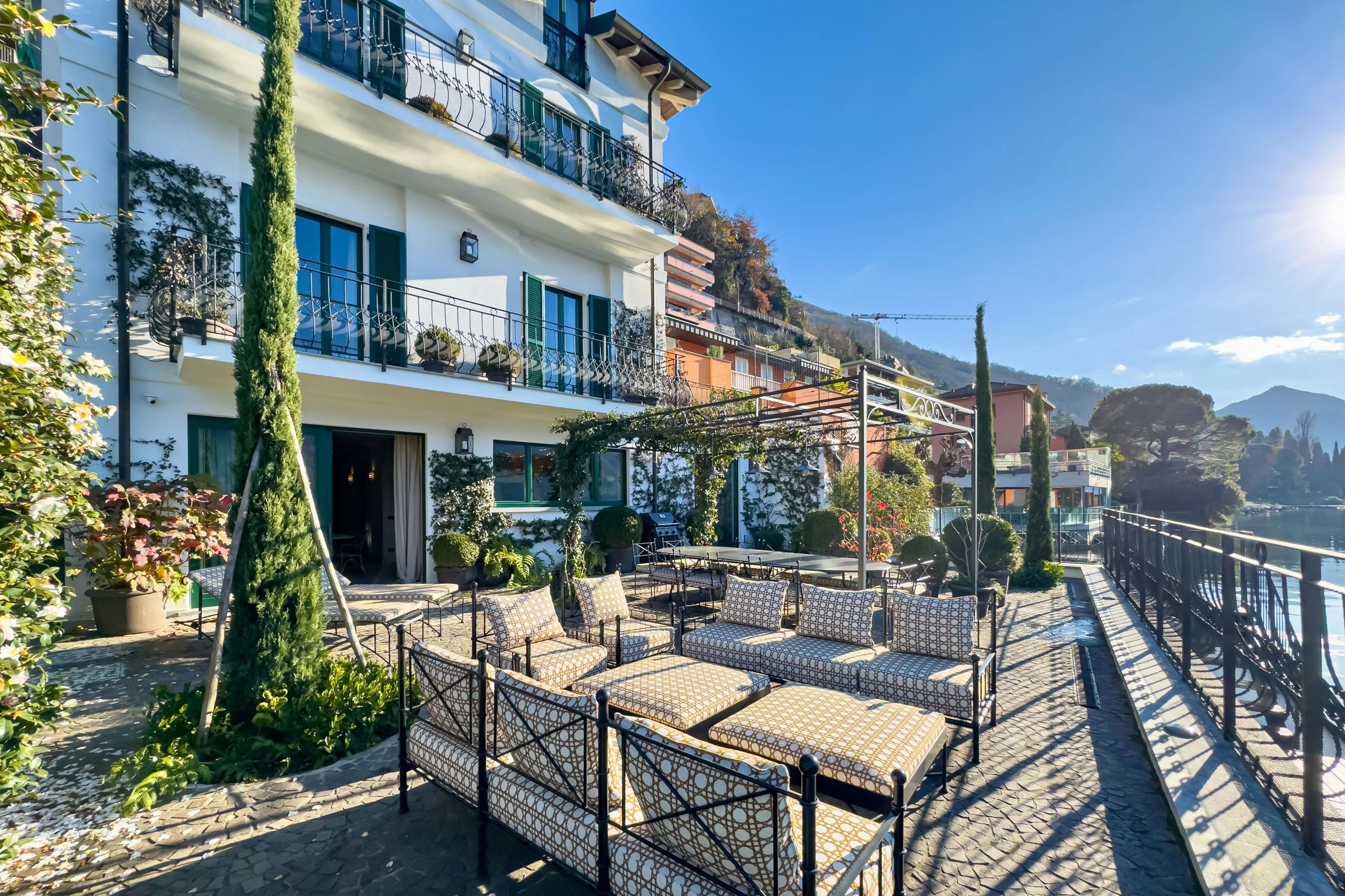 430 m² of living space directly on Lake Lugano - Timeless villa in Campione d'Italia with lake terrace, private jetty &amp; two boat moorings