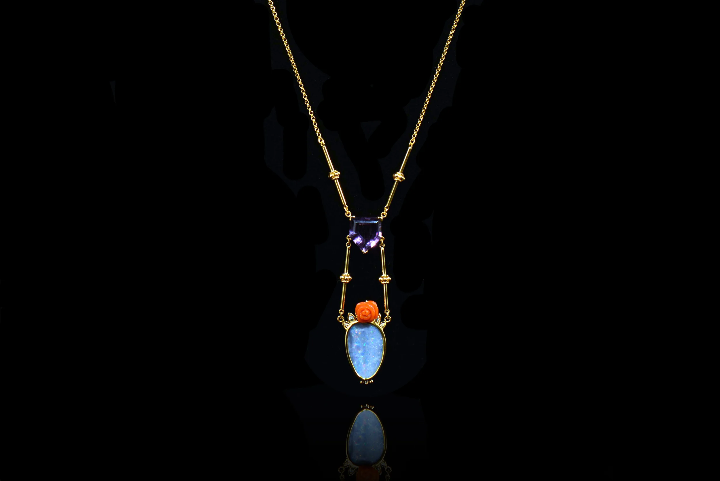 Lavaliere with coral flower