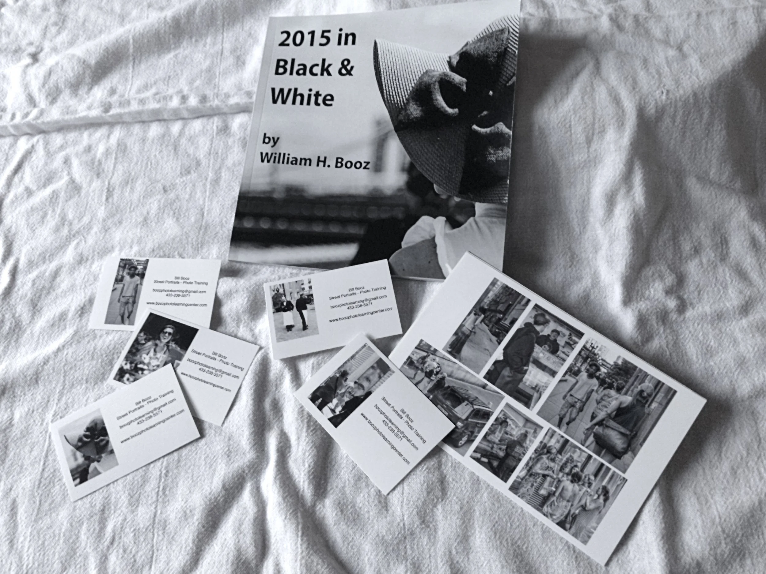 Handout cards, sample images, and a Blurb book of B&Ws from 2015.