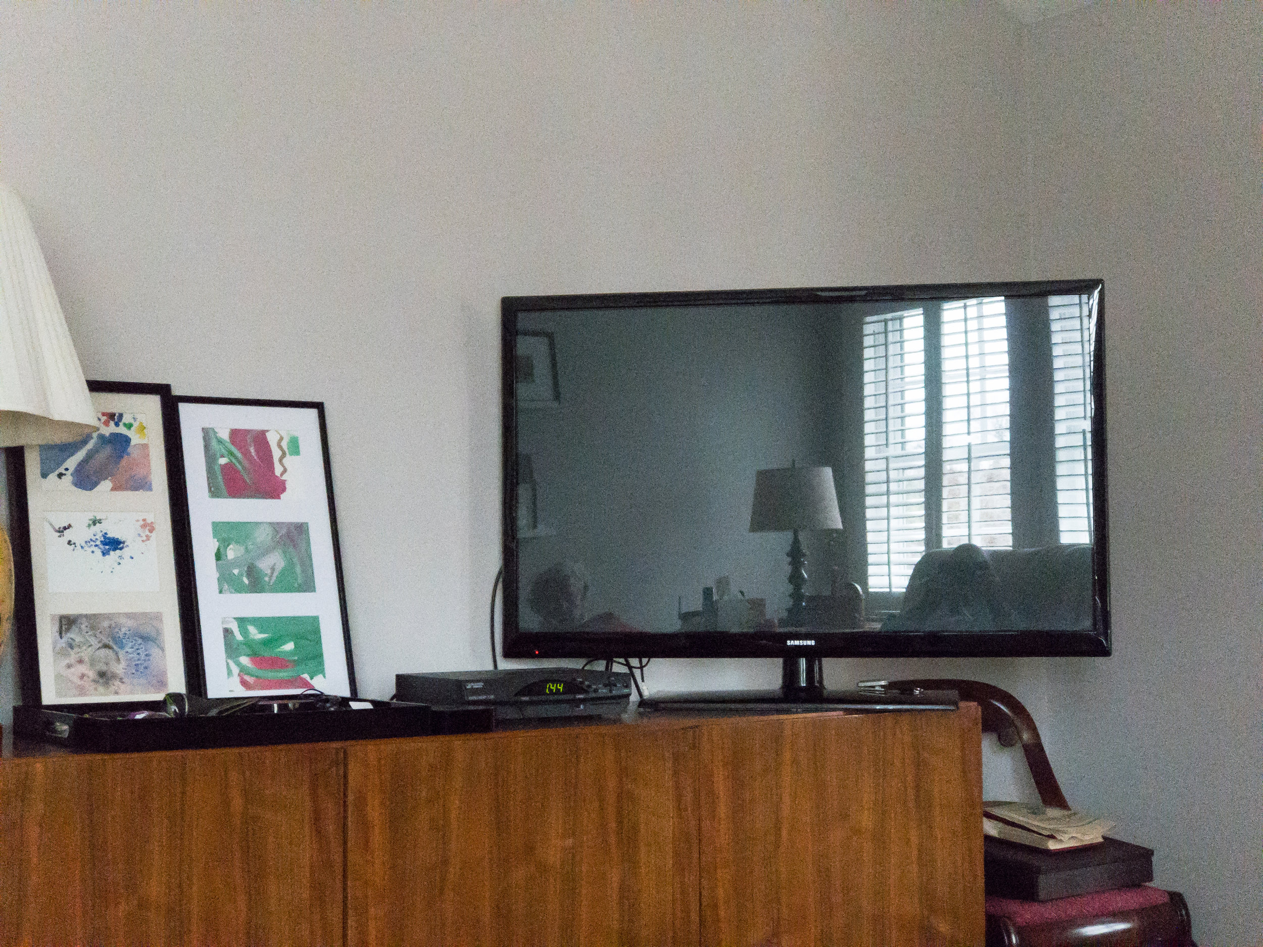 Watching ourselves in the TV screen.