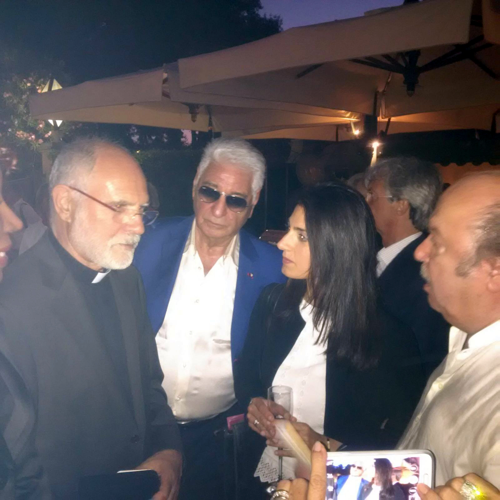 11 LUGLIO 2016. ROMA. FESTA PER GLI 80 ANNI DI LINO BANFI. DA SINISTRA:&nbsp;DON SERGIO MERCANZIN, CARLO MAIETTO,&nbsp;LA SINDACO DI ROMA VIRGINIA RAGGI E LINO BANFI.&nbsp;
