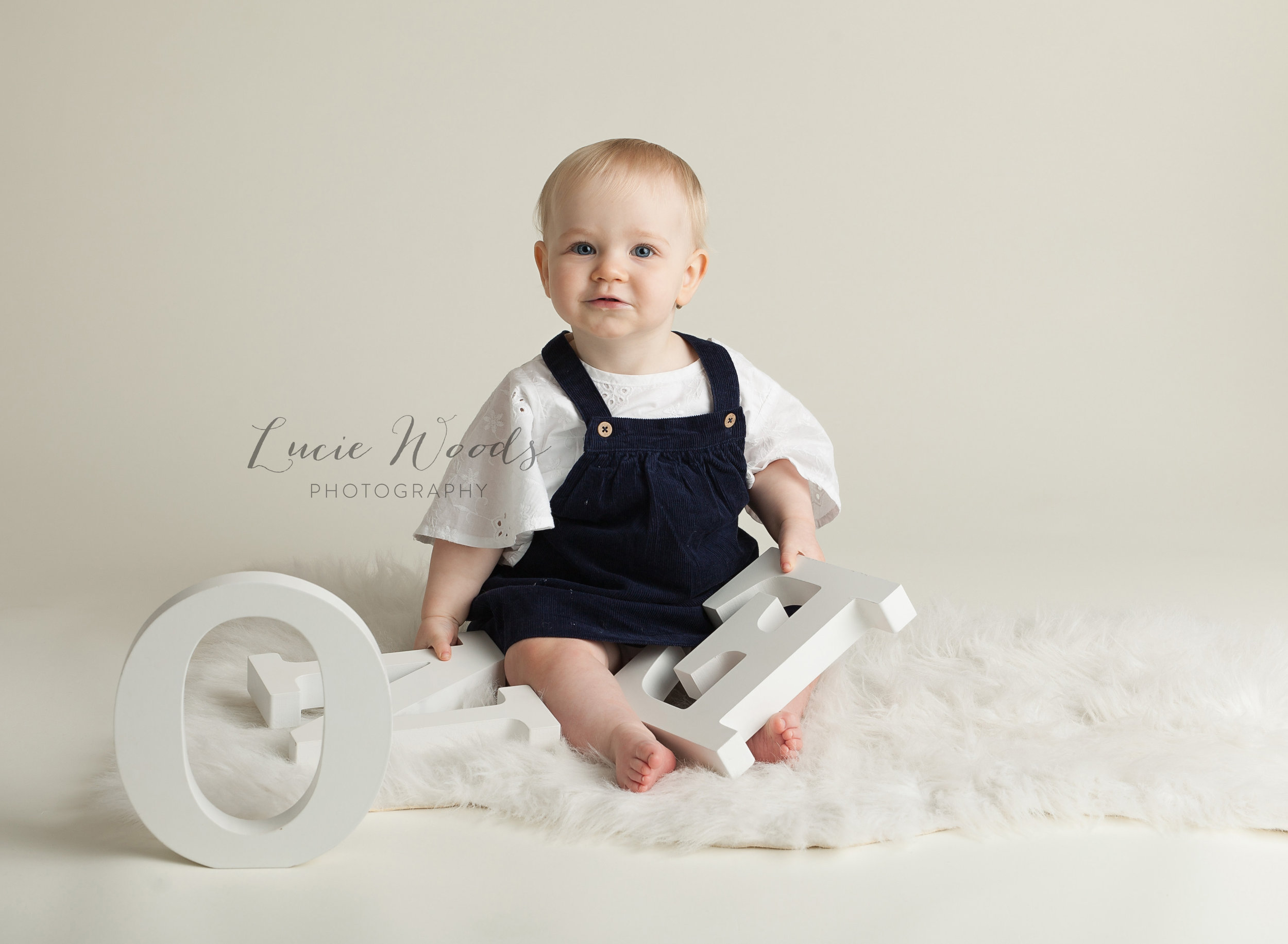 Newborn photographer baby photography Manchester Lancashire Rawtenstall Lucie Woods Photography Altrincham Hale Ramsbottom cute baby photos photo cake smash cake-smash milestones