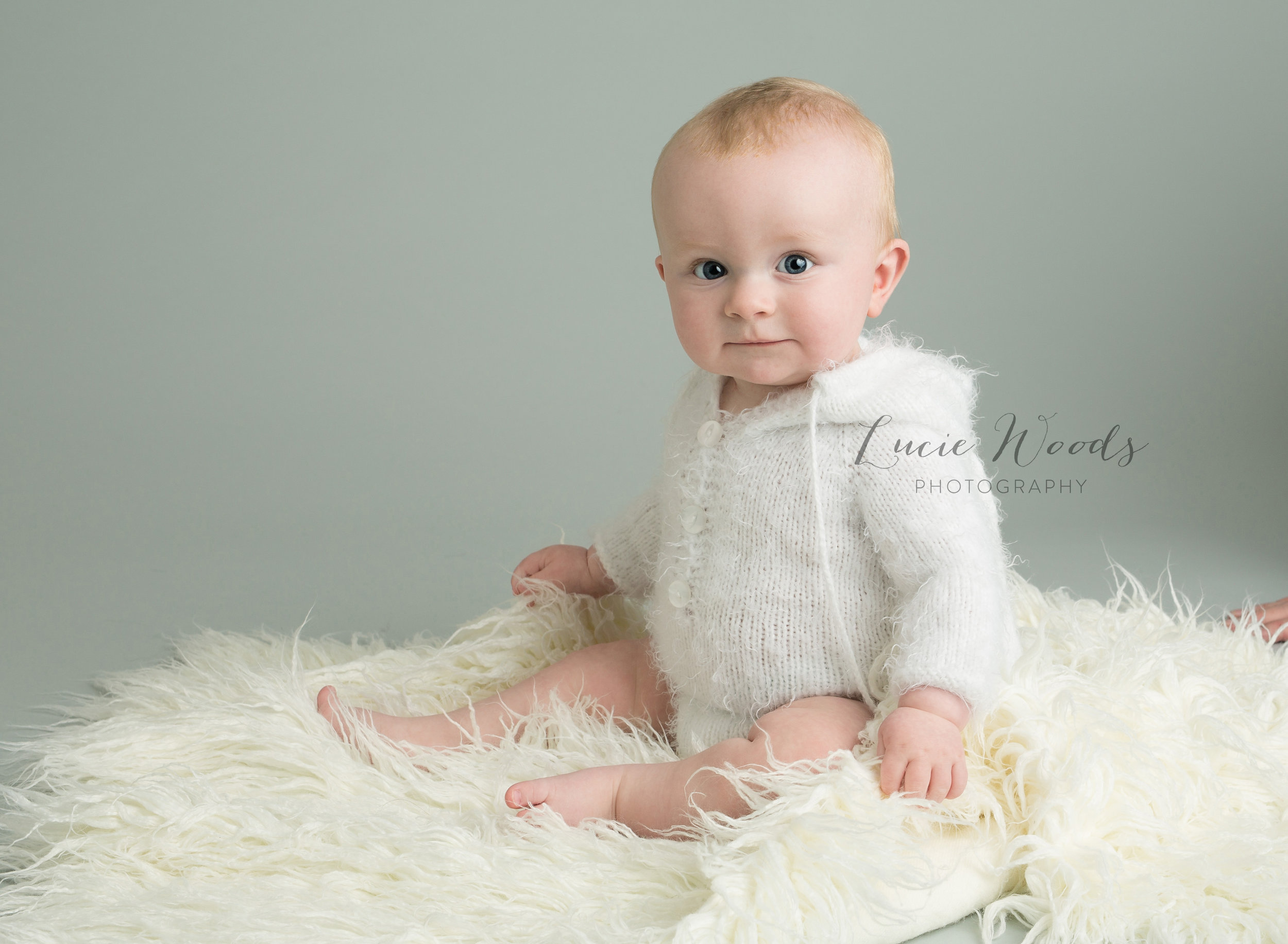 Newborn photographer Manchester newborn baby photography Lancashire Altrincham Hale Bury Bolton Rawtenstall baby photos Lucie Woods Photography Ramsbottom cute baby photos photo cake smash milestones