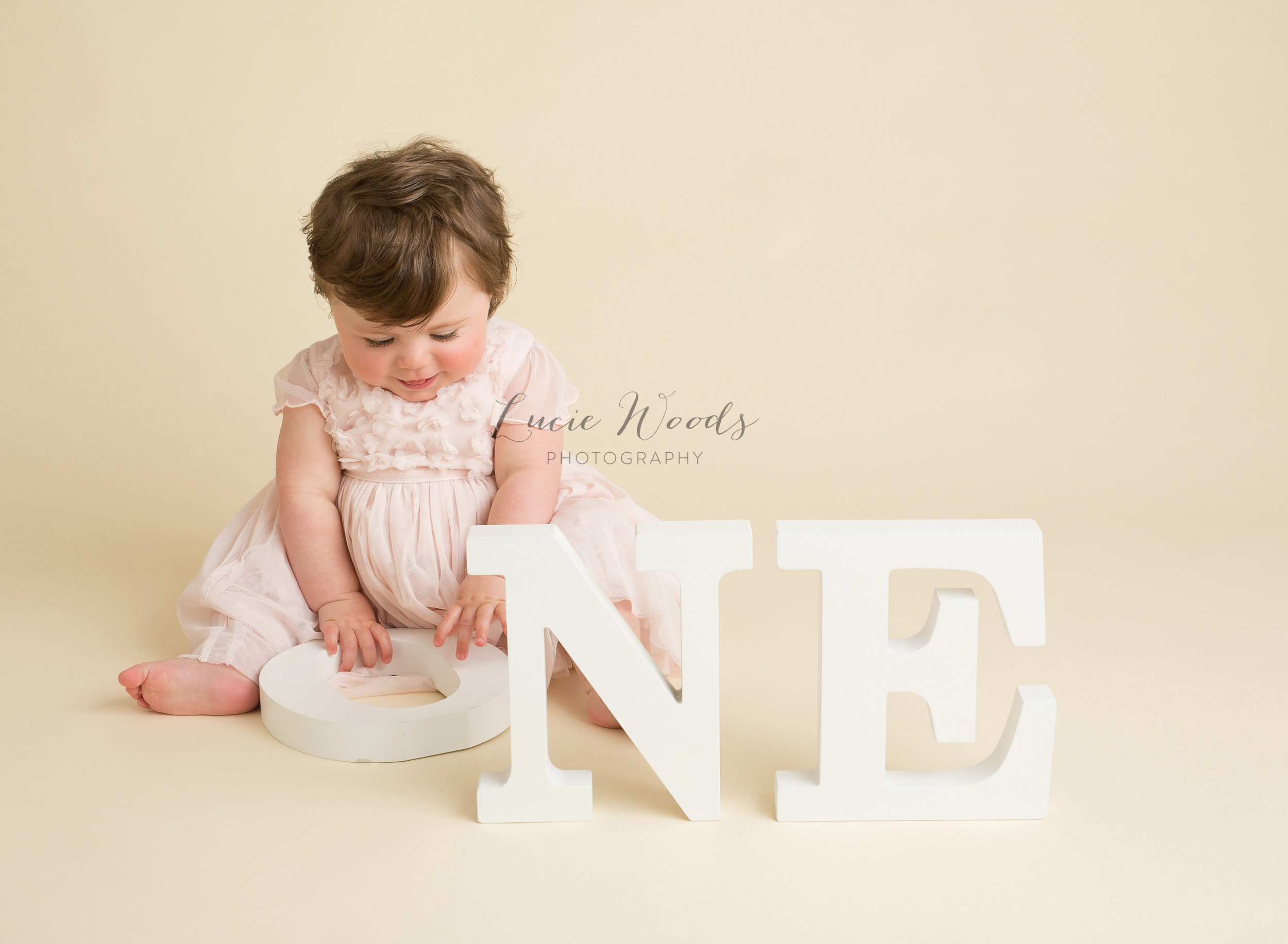 Newborn photographer baby photos photo Manchester Lancashire Rawtenstall Lucie Woods Photography cake smash milestones