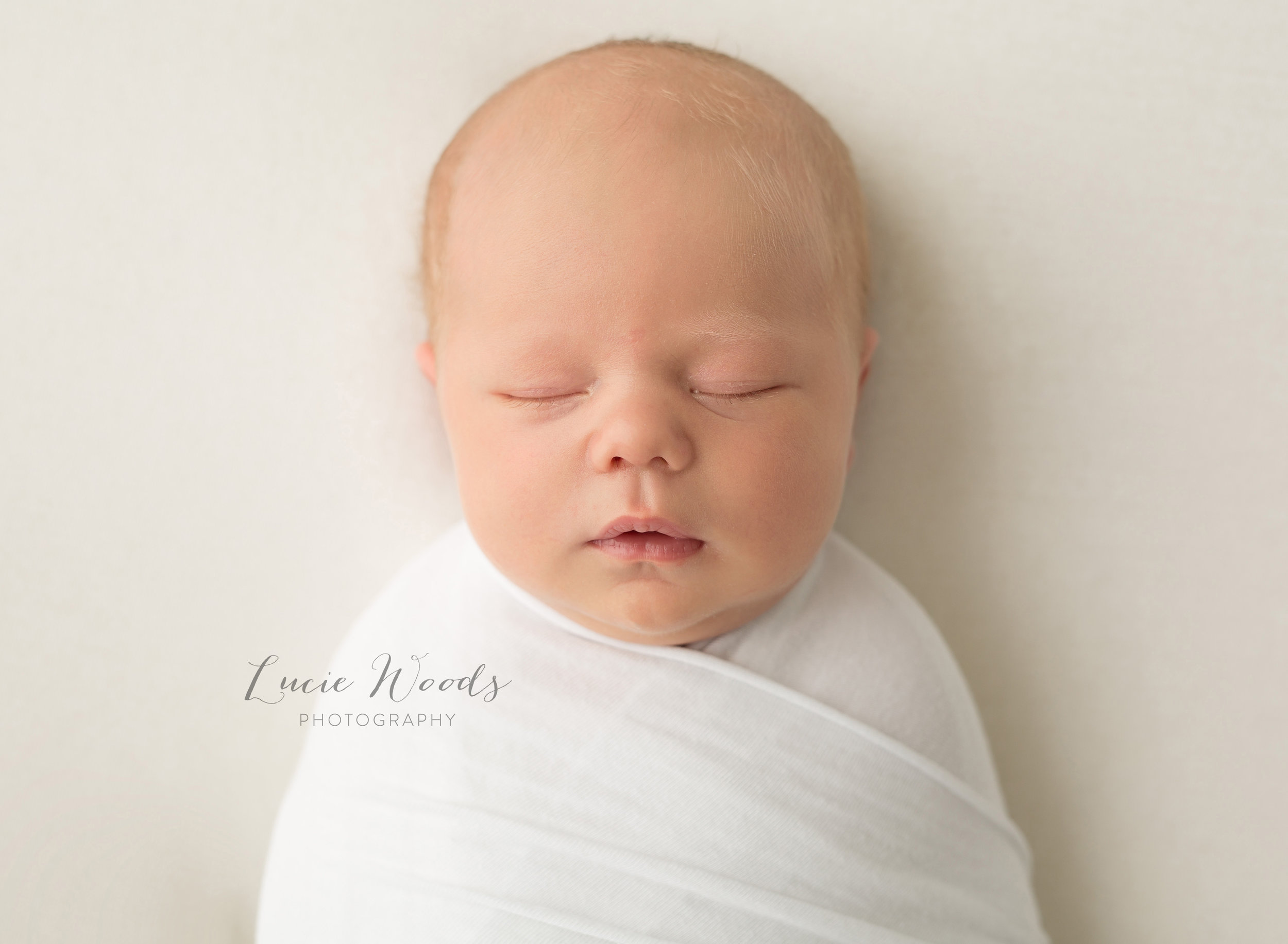 Newborn photographer Manchester newborn baby photography Lancashire Altrincham Hale Bury Bolton Rawtenstall baby photos Lucie Woods Photography Ramsbottom cute baby photos photo cake smash milestones