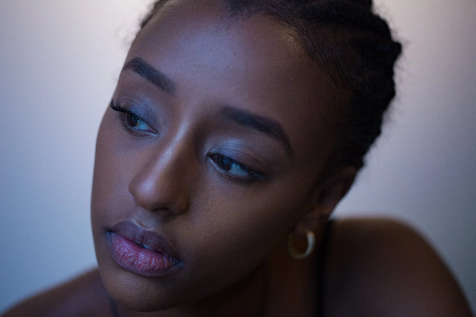 Portrait of a beautiful black woman w/bokeh