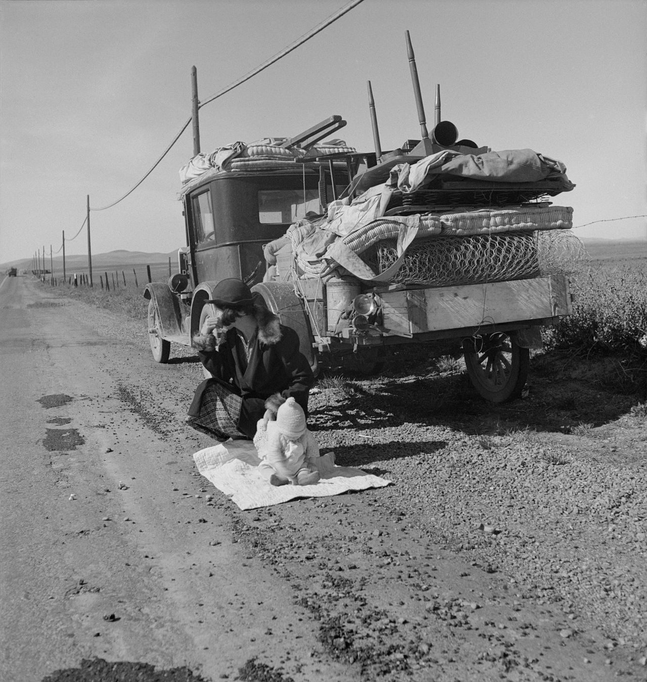 %22Broke,_baby_sick,_and_car_trouble!%22_-_Dorothea_Lange's_photo_of_a_Missouri_family_of_five_in_the_vicinity_of_Tracy,_California-POVERTY-THE ROAD.jpg