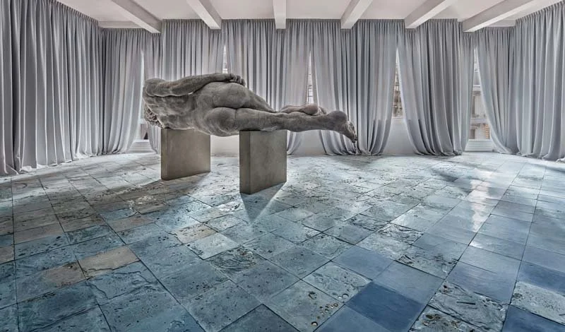  Adrián Villar Rojas and Álvaro Enrigue  Adrián Villar Rojas,  Two Suns , 2015. Unfired clay and cement recreation of David by Michelangelo, blackout curtains, handmade tiles (cement, sand, turba, and pigments) embedded with organic, inorganic, human