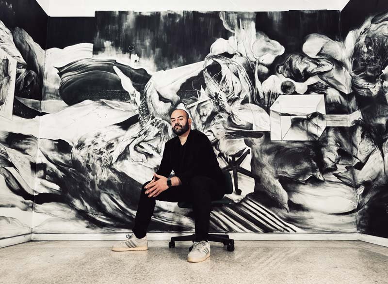   Shadows of a Wanderer , 2021-2023, charcoal on wall. Courtesy the artist. 