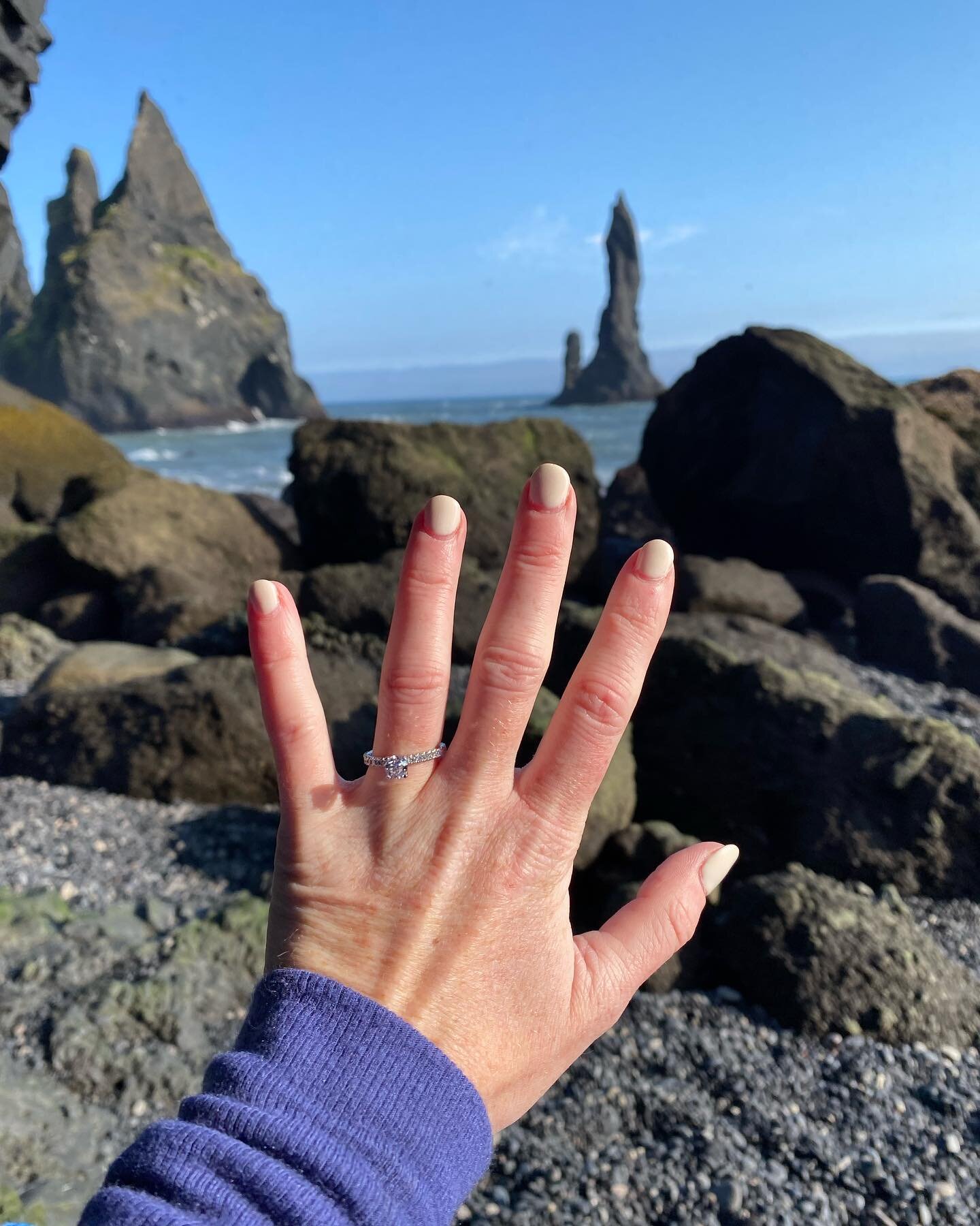 We got engaged in Iceland! Literally blown away (swipe for windy photo). #cheers #sk&aacute;l