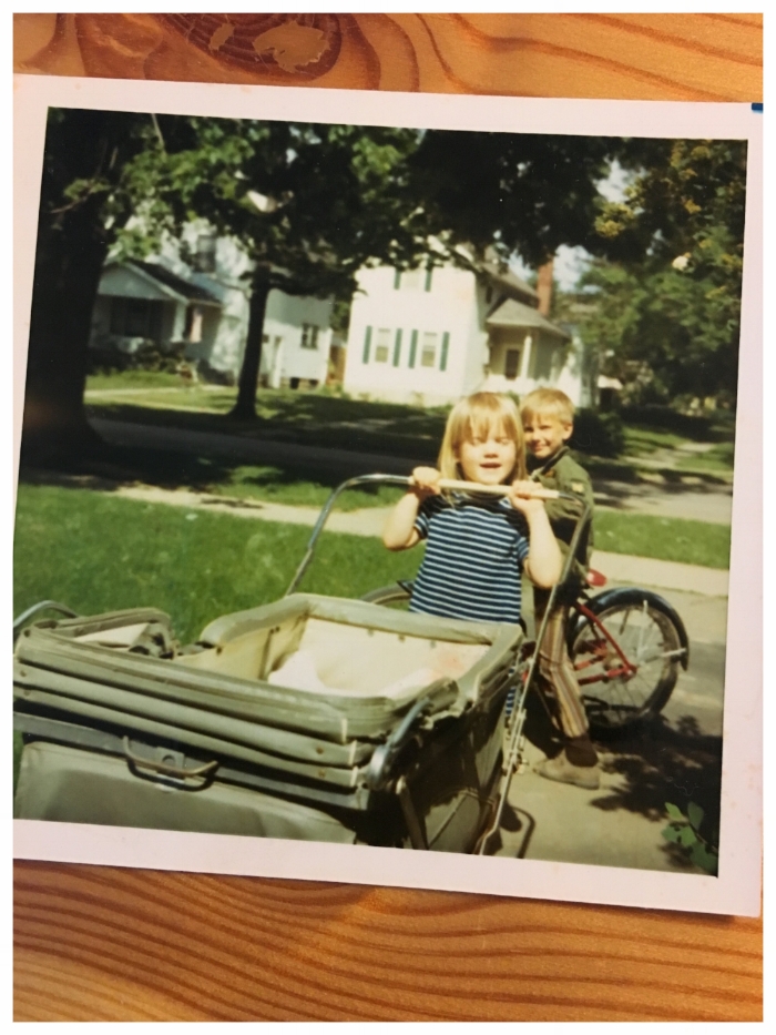 Finally, here is a picture of my big sister (and a neighbor boy) pushing me around in a stroller sometime around 1971. I used this picture or the idea of it in Gem & Dixie.