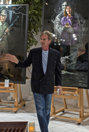 Connie's husband, Nicholas Petrucci, unveils the portrait of Guardian Mary Barley.