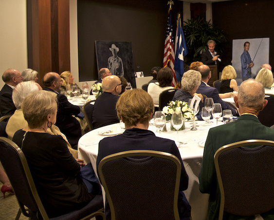 Nicholas at the podium at a private event earlier this year.