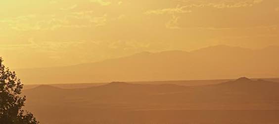 Sunset across the valley and volcanos to Mt. Taylor