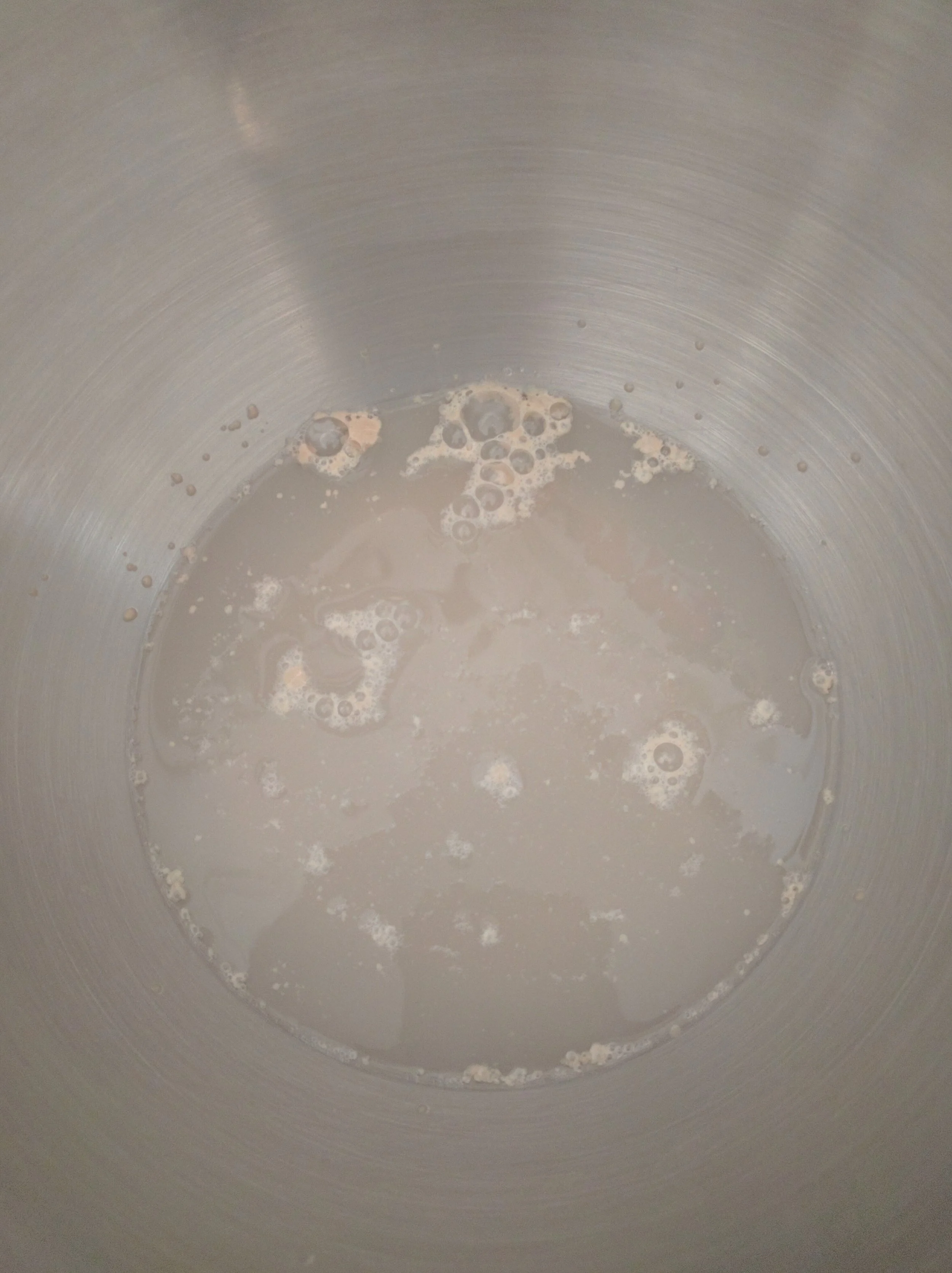 Let the yeast and the hot water do their thing for 5 minutes before adding the oil, salt, and flour!