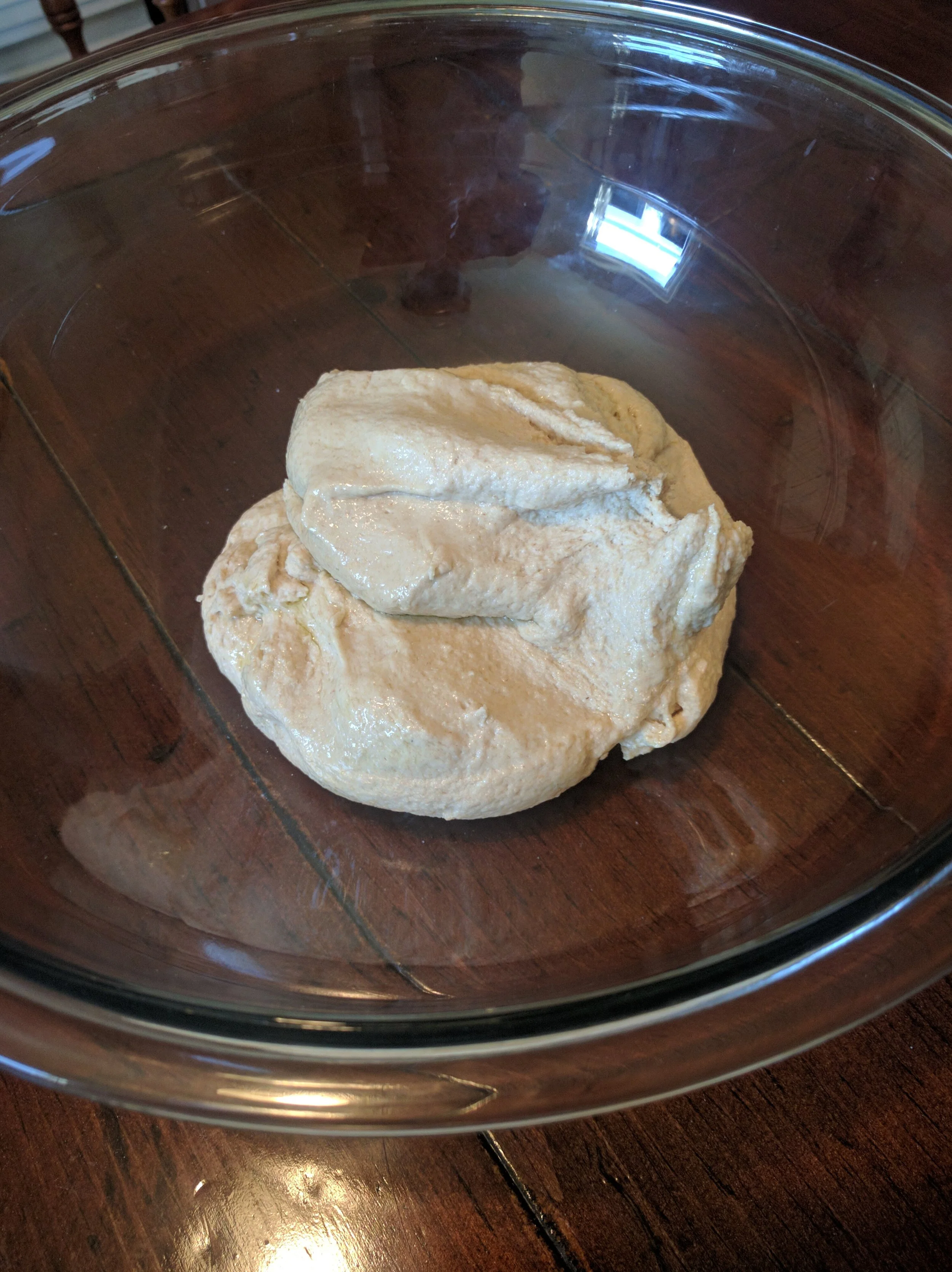 After kneading the dough for 5 minutes, lightly oil then place in a clean bowl.