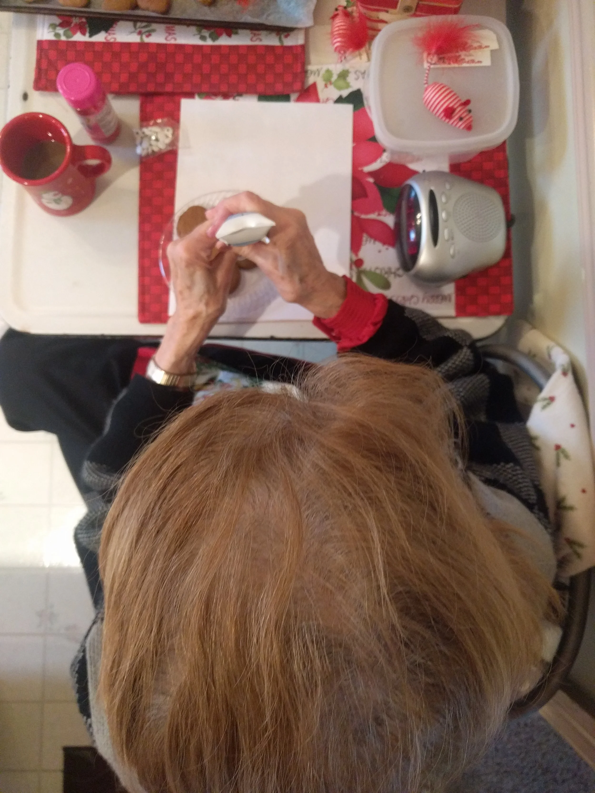 Nannie decorating her gingerbread man