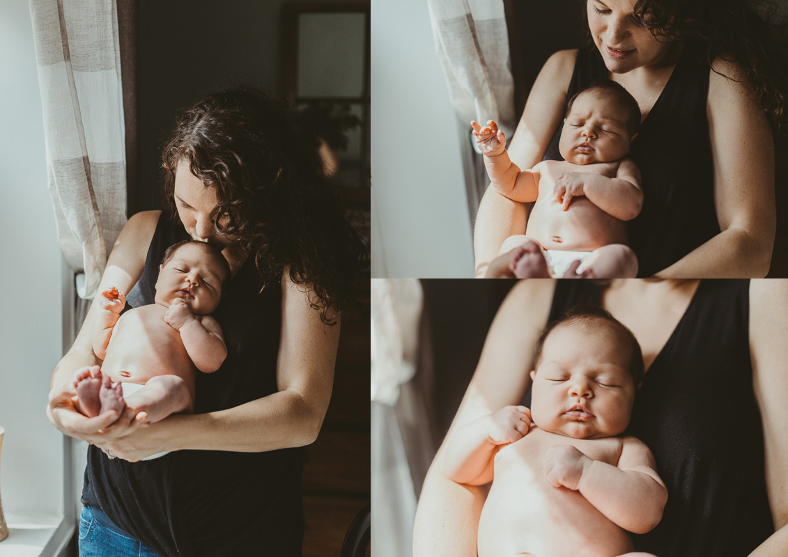 mother-holding-her-newborn-baby-girl-photos.jpg