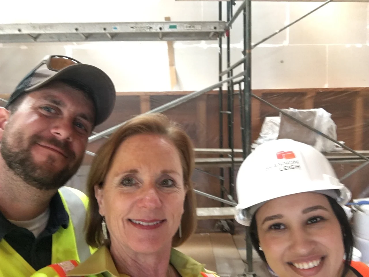Chris, Shannon, and Shereen checking sign locations in one of the buildings.